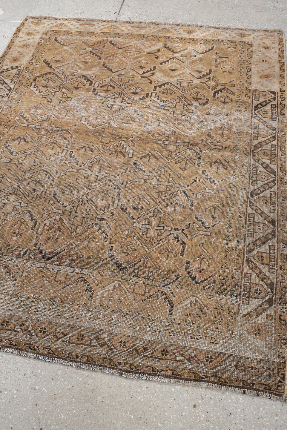 4' x 5' one-of-a-kind handmade vintage Afshar small size rug. Color palette: camel, taupe, ivory, brown, beige, gray
