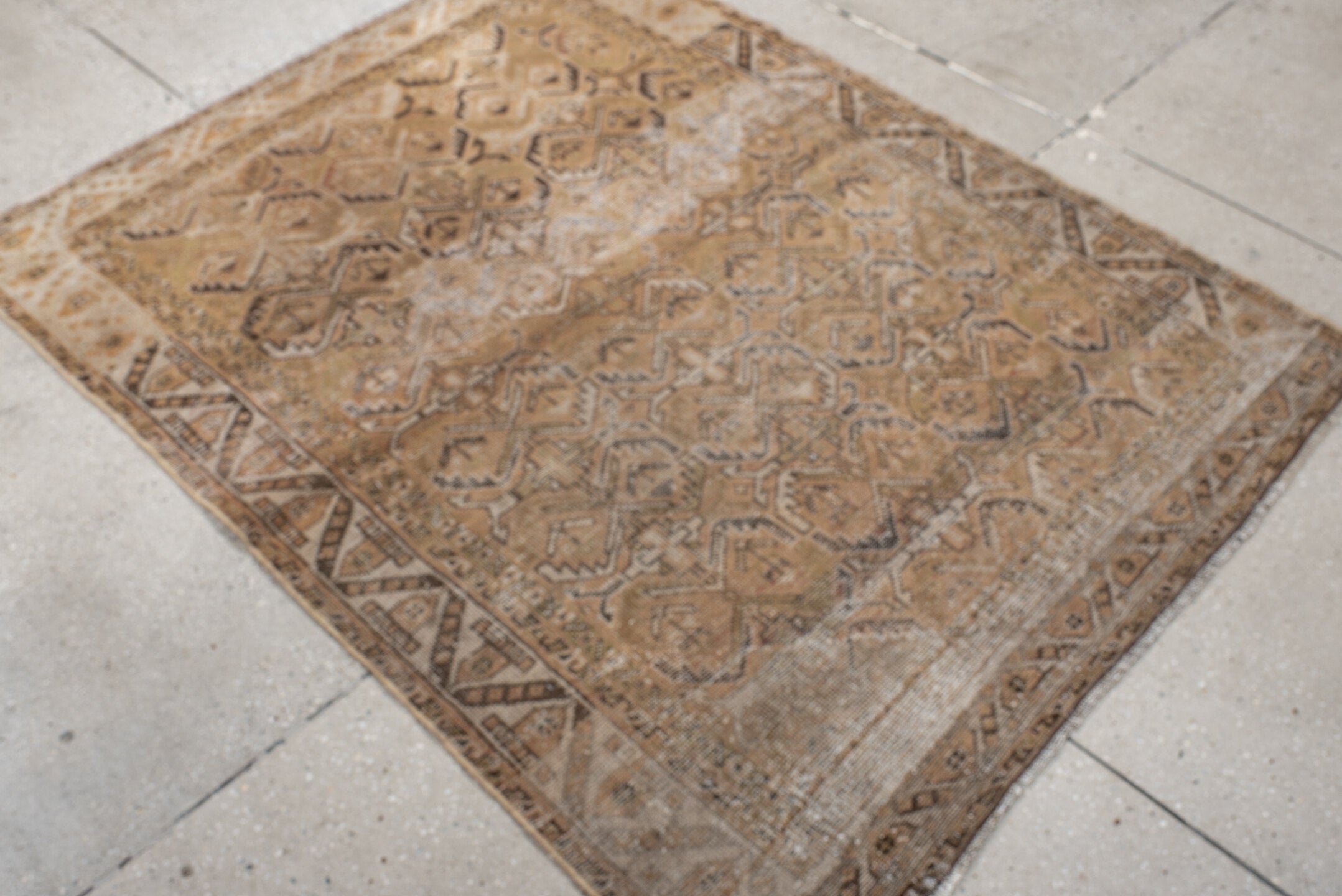 4' x 5' one-of-a-kind handmade vintage Afshar small size rug. Color palette: camel, taupe, ivory, brown, beige, gray