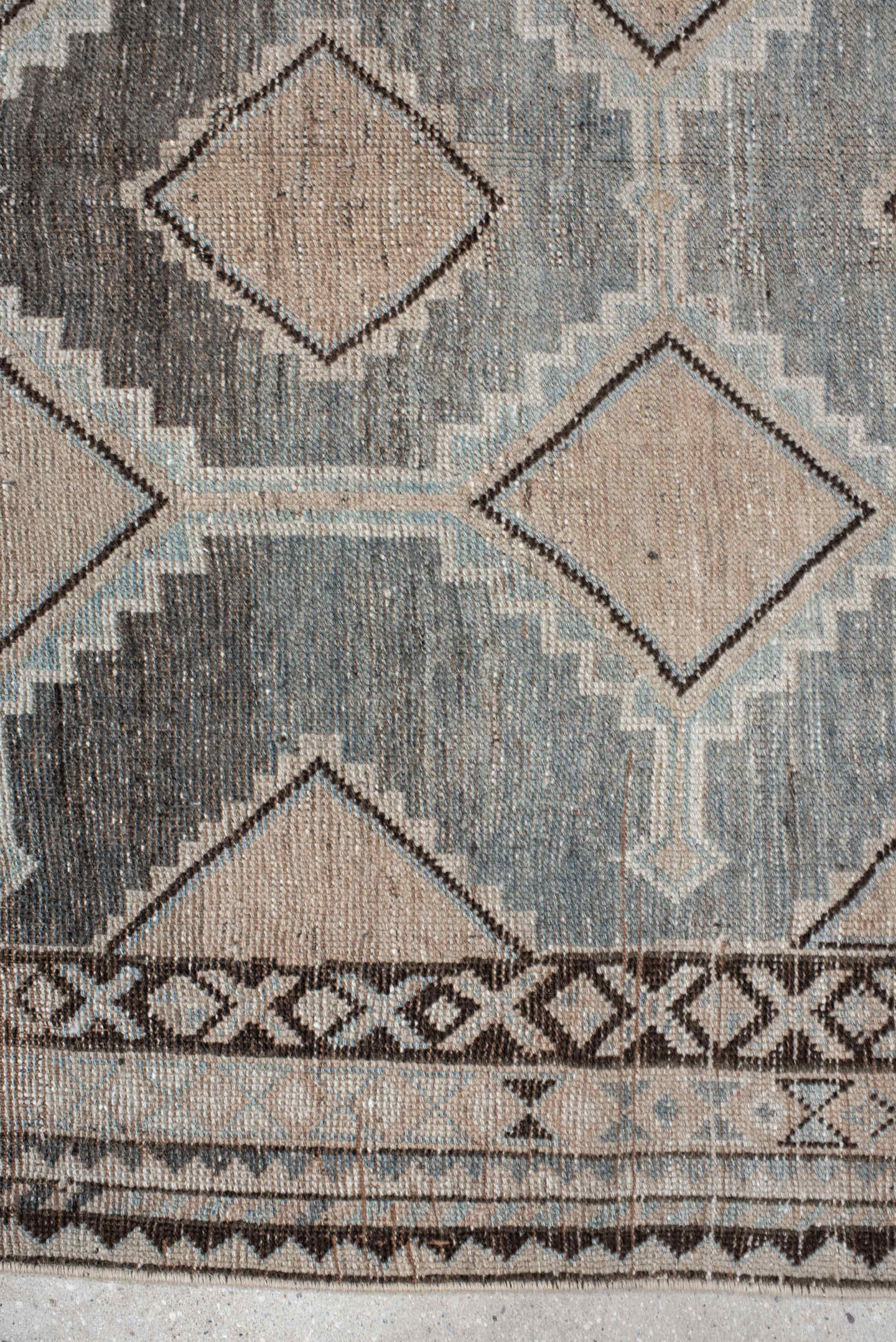4' x 8' one-of-a-kind handmade vintage Gabbe rug. Color palette: ivory, blue, charcoal, taupe, brown, camel, gray, black