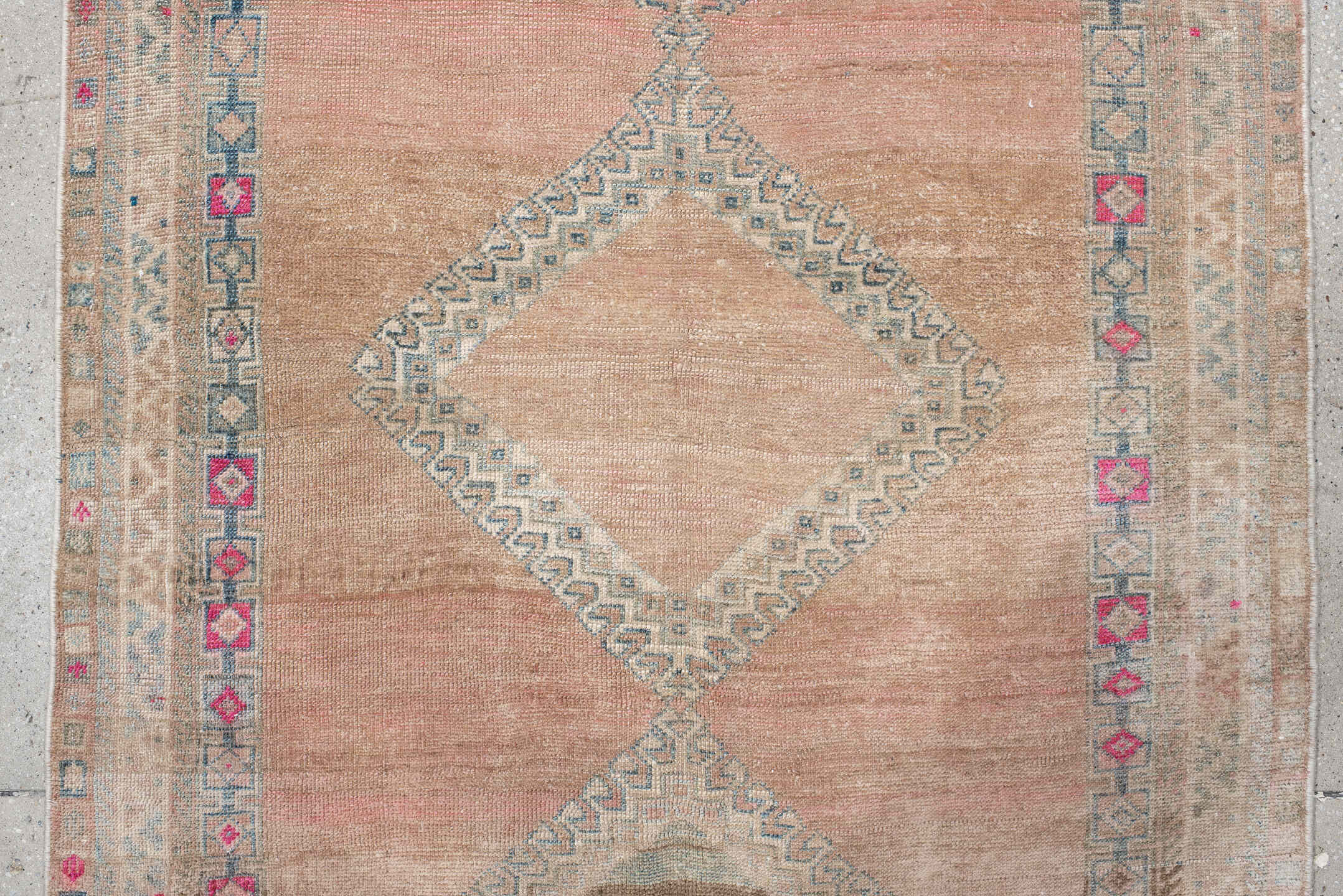 3' x 7' one-of-a-kind handmade vintage runner rug. Color palette: blush, ivory, pale blue, rose, taupe, brown, pink
