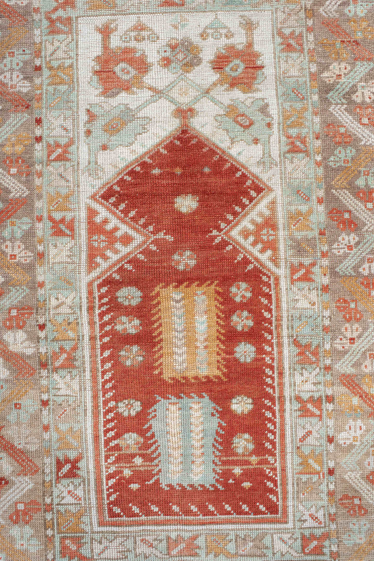 4' x 5' one-of-a-kind handmade vintage Anatolian small size rug. Color palette: terra cotta, ivory, pale aqua, sand, rust