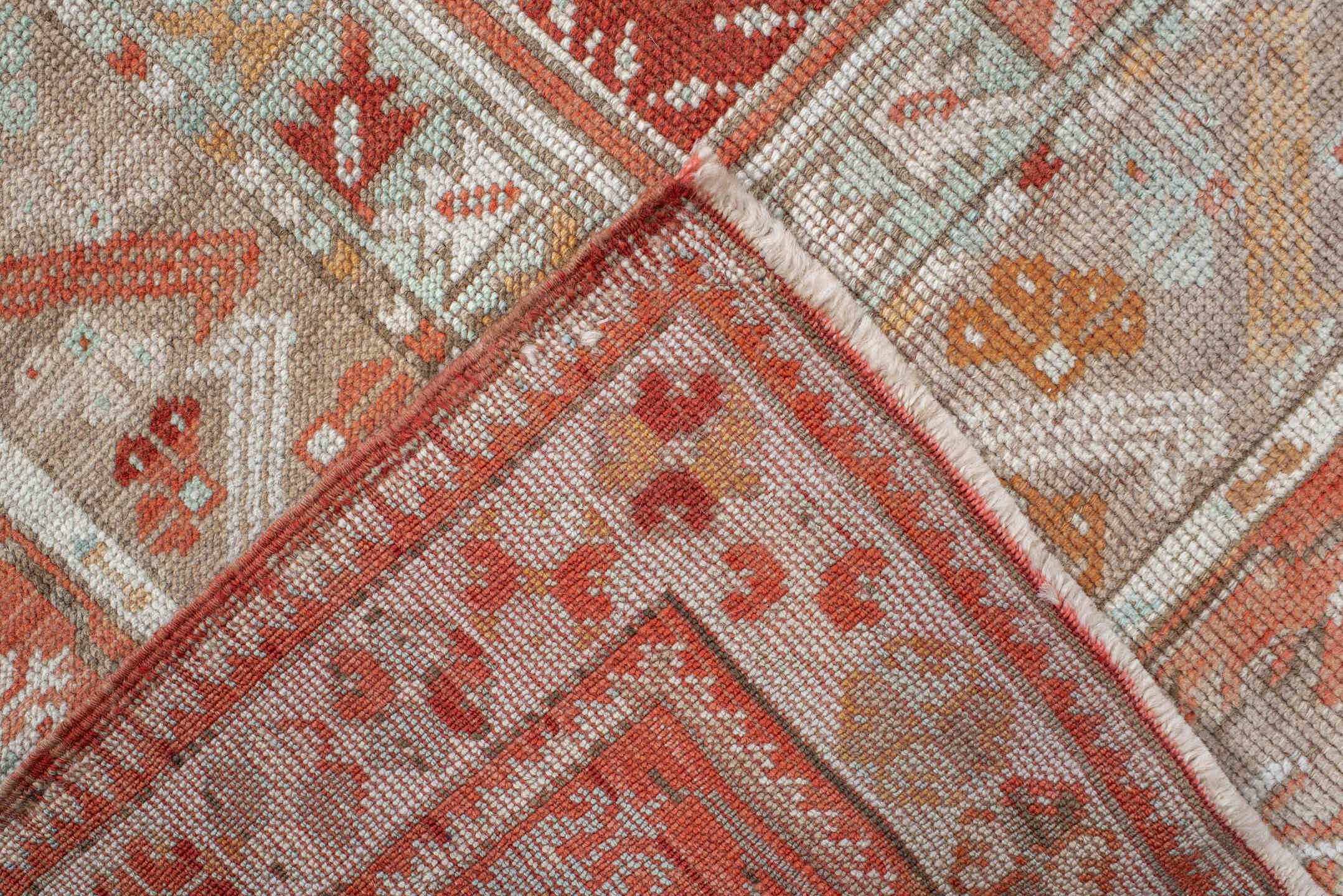 4' x 5' one-of-a-kind handmade vintage Anatolian small size rug. Color palette: terra cotta, ivory, pale aqua, sand, rust