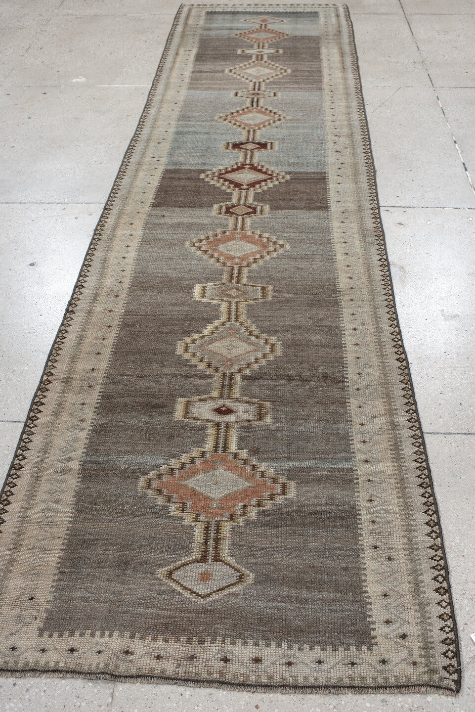 2' x 11' one-of-a-kind handmade vintage Gabbe runner rug. Color palette: taupe, ivory, slate, camel, rose, brown, beige