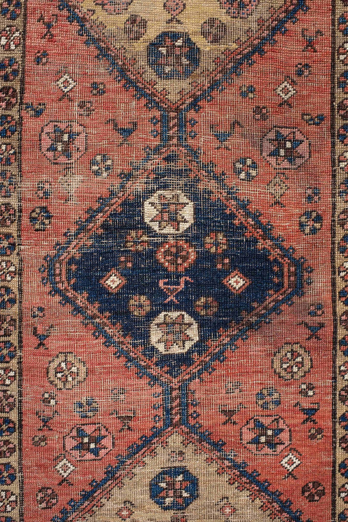 3' x 6' one-of-a-kind handmade antique runner rug. Color palette: rose, indigo, ivory, rust, navy, camel, crimson, pink