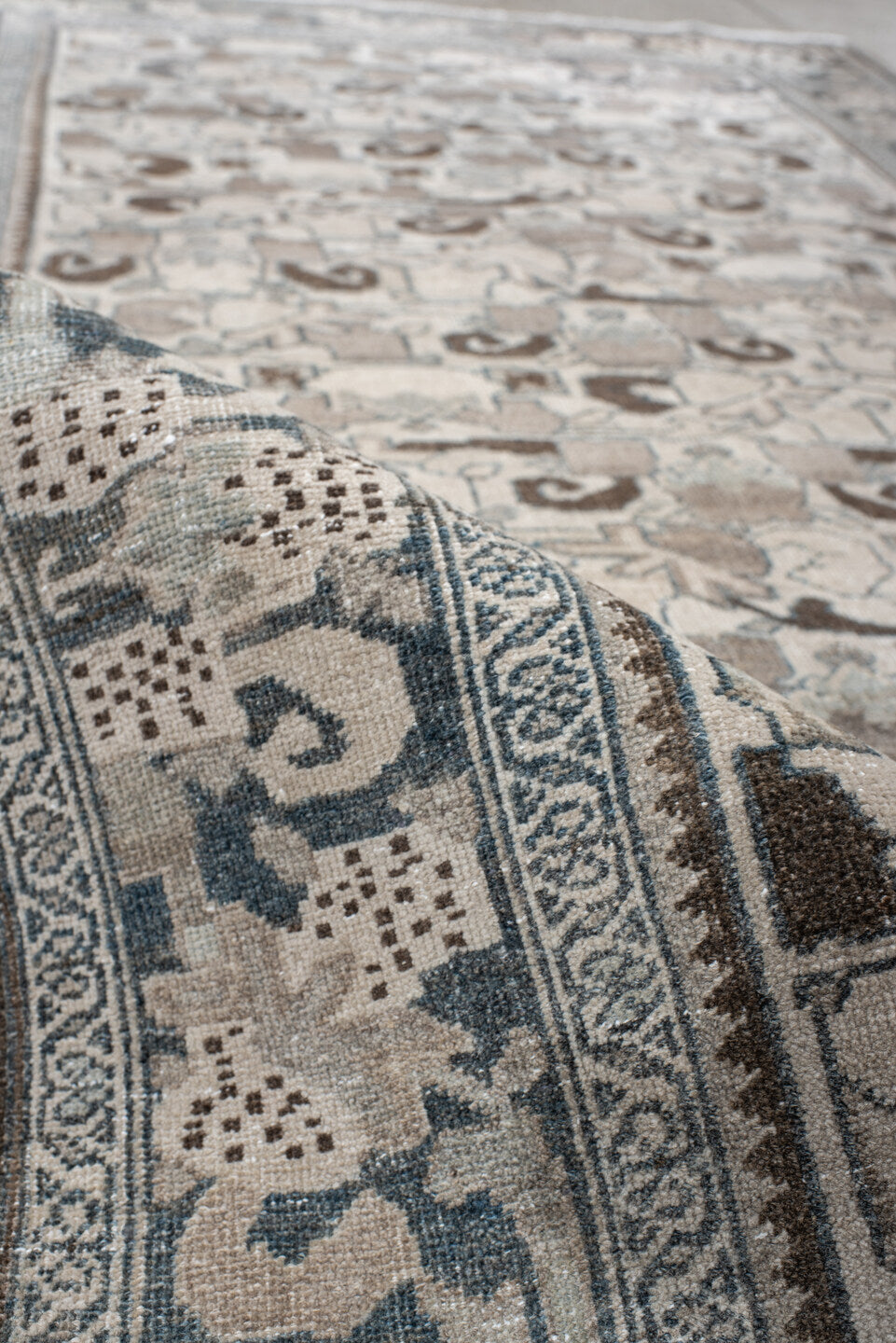 4' x 8' one-of-a-kind handmade vintage Bidjar rug. Color palette: ivory, pale blue, taupe, brown, gray, beige, light blue