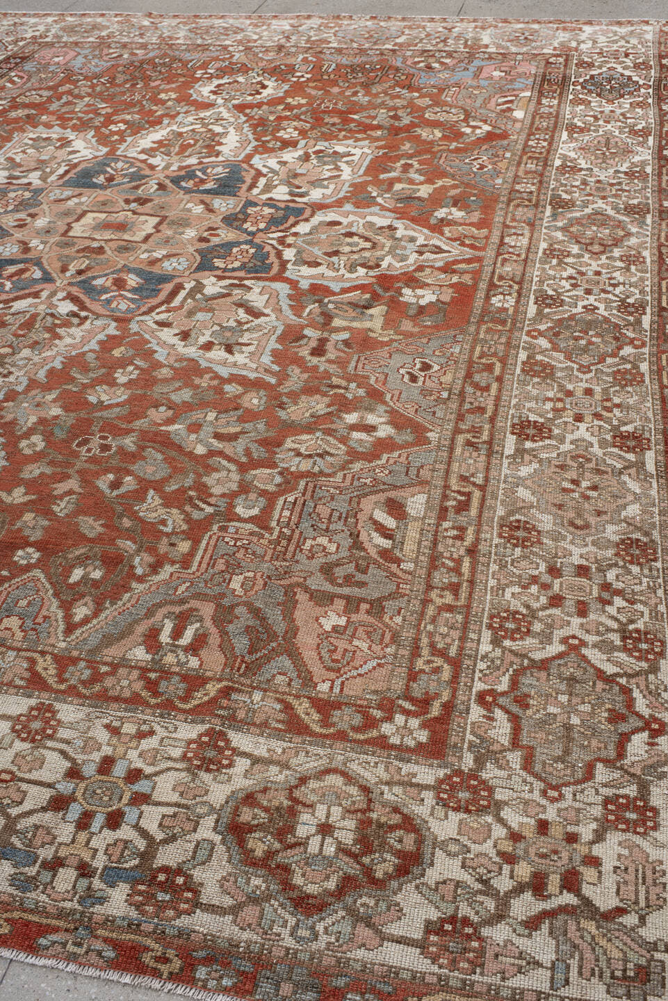 10' x 13' one-of-a-kind handmade vintage Baktiary large size rug. Color palette: rust, ivory, dusty_blue, rose, taupe, camel