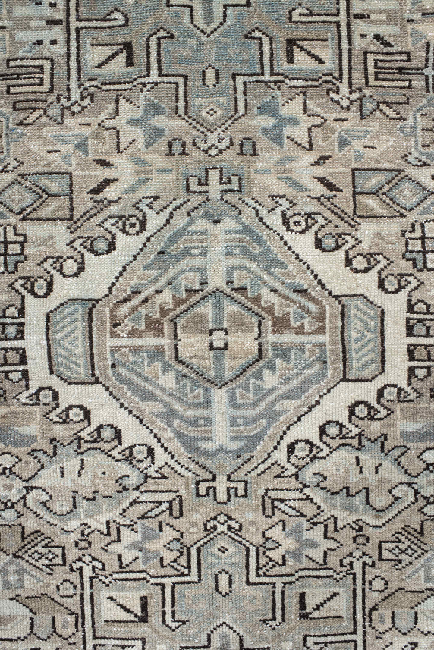5' x 6' one-of-a-kind handmade vintage Karaje rug. Color palette: ivory, pale blue, taupe, charcoal, beige, slate