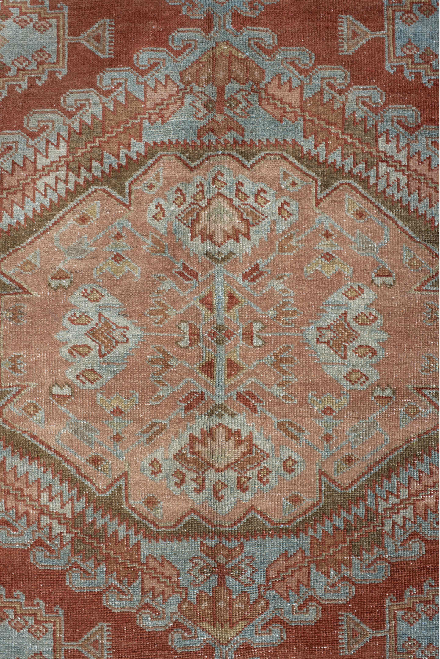 5' x 6' one-of-a-kind handmade vintage Veece rug. Color palette: terra cotta, pale blue, sage, ivory, rose, olive