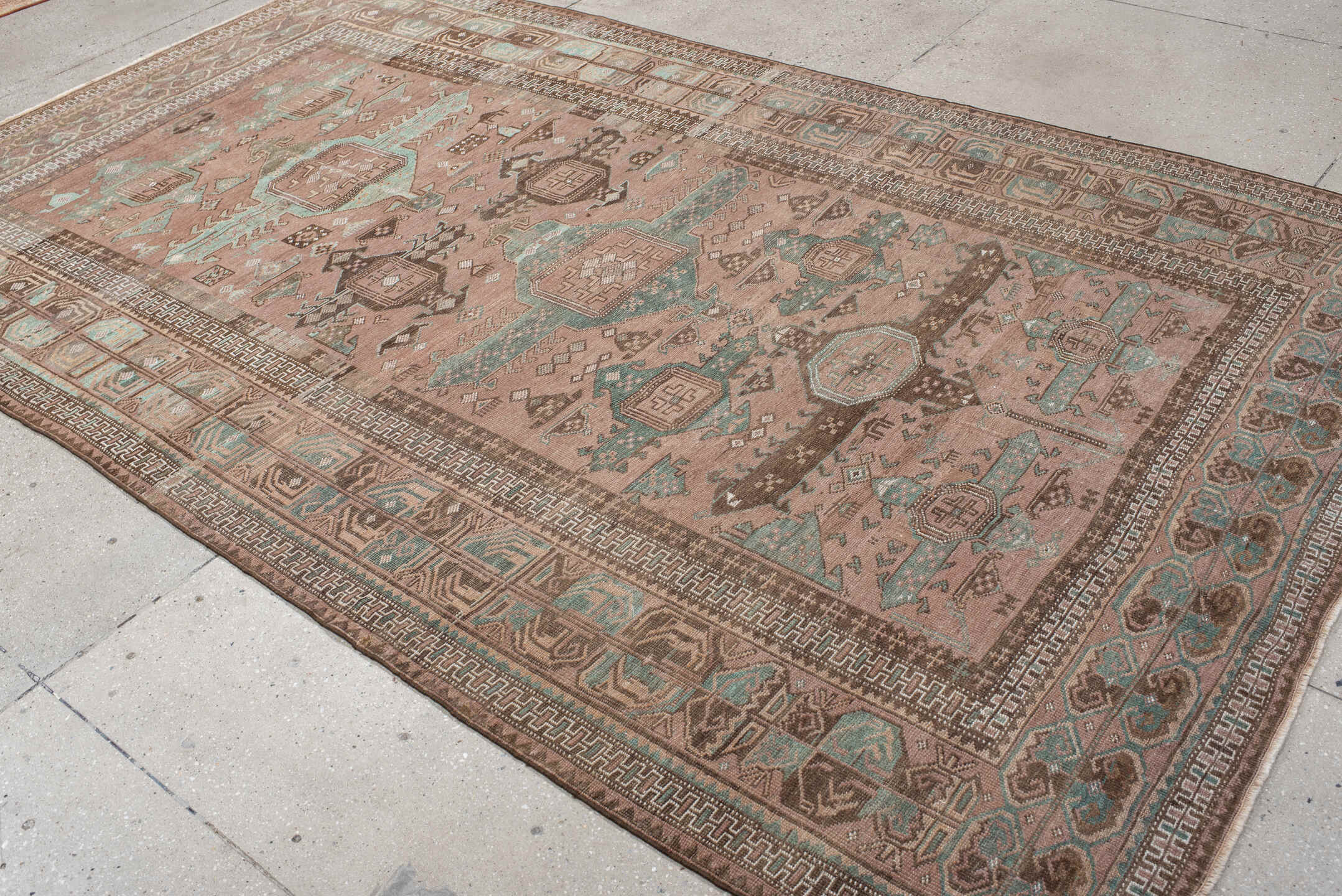 6' x 10' one-of-a-kind handmade vintage Belouch large size rug. Color palette: gray, light gray, brown, off-white, pink