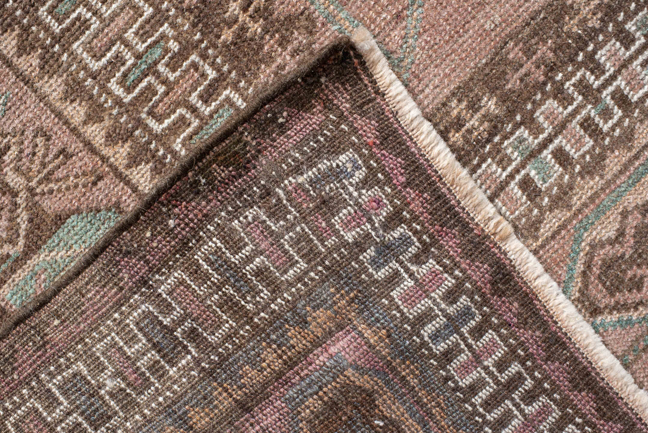 6' x 10' one-of-a-kind handmade vintage Belouch large size rug. Color palette: gray, light gray, brown, off-white, pink