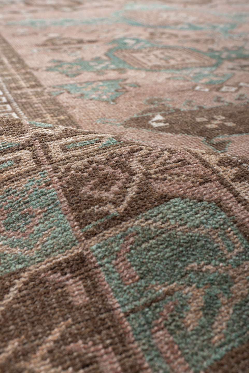 6' x 10' one-of-a-kind handmade vintage Belouch large size rug. Color palette: gray, light gray, brown, off-white, pink