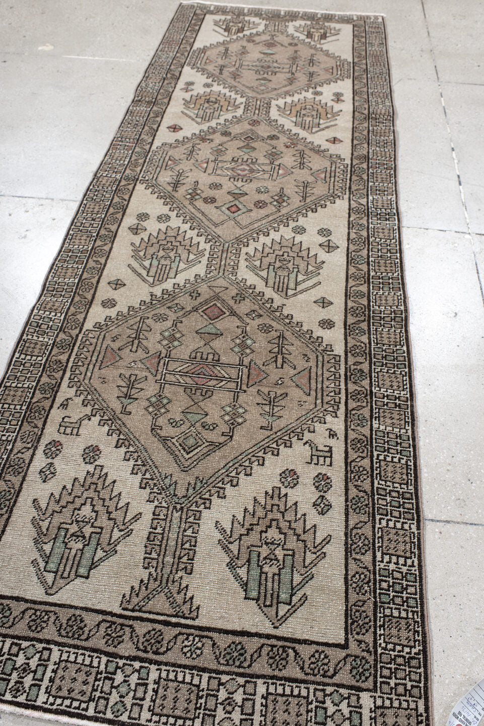 3' x 9' one-of-a-kind handmade vintage Sarab runner rug. Color palette: ivory, taupe, charcoal, sage, rust, camel, beige