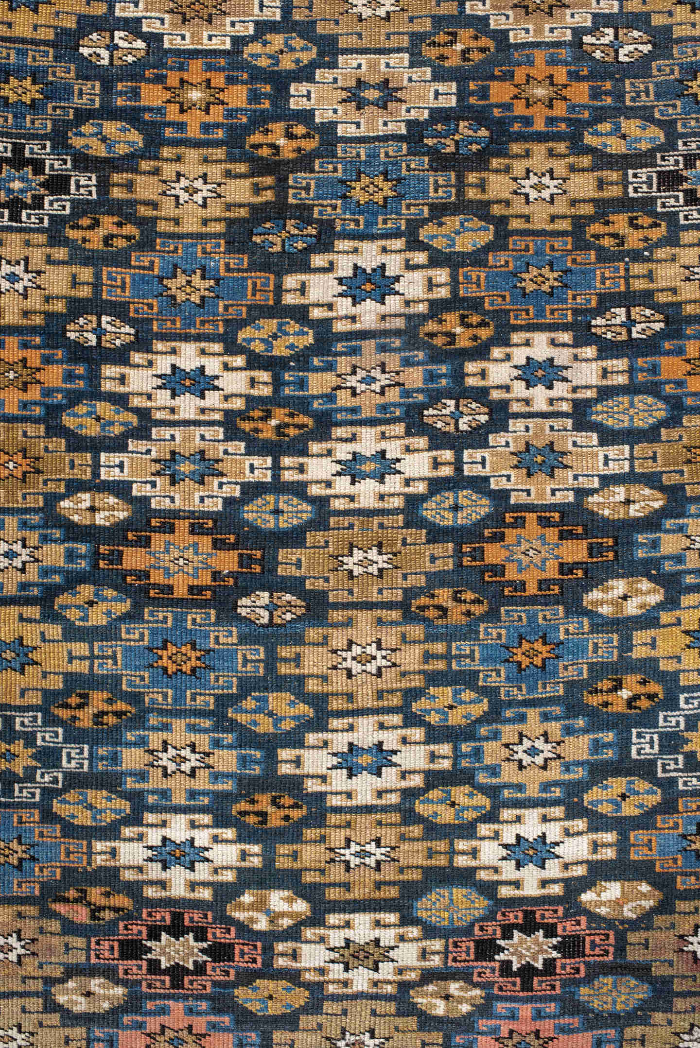 3' x 5' one-of-a-kind handmade vintage Caucasian small size rug. Color palette: navy, camel, ivory, sky blue, rust, brown