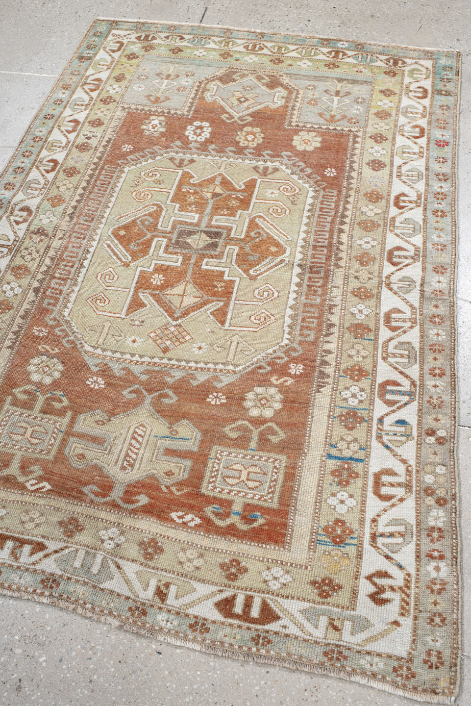 3' x 5' one-of-a-kind handmade vintage Anatolian small size rug. Color palette: rust, ivory, pale aqua, sage, taupe, camel