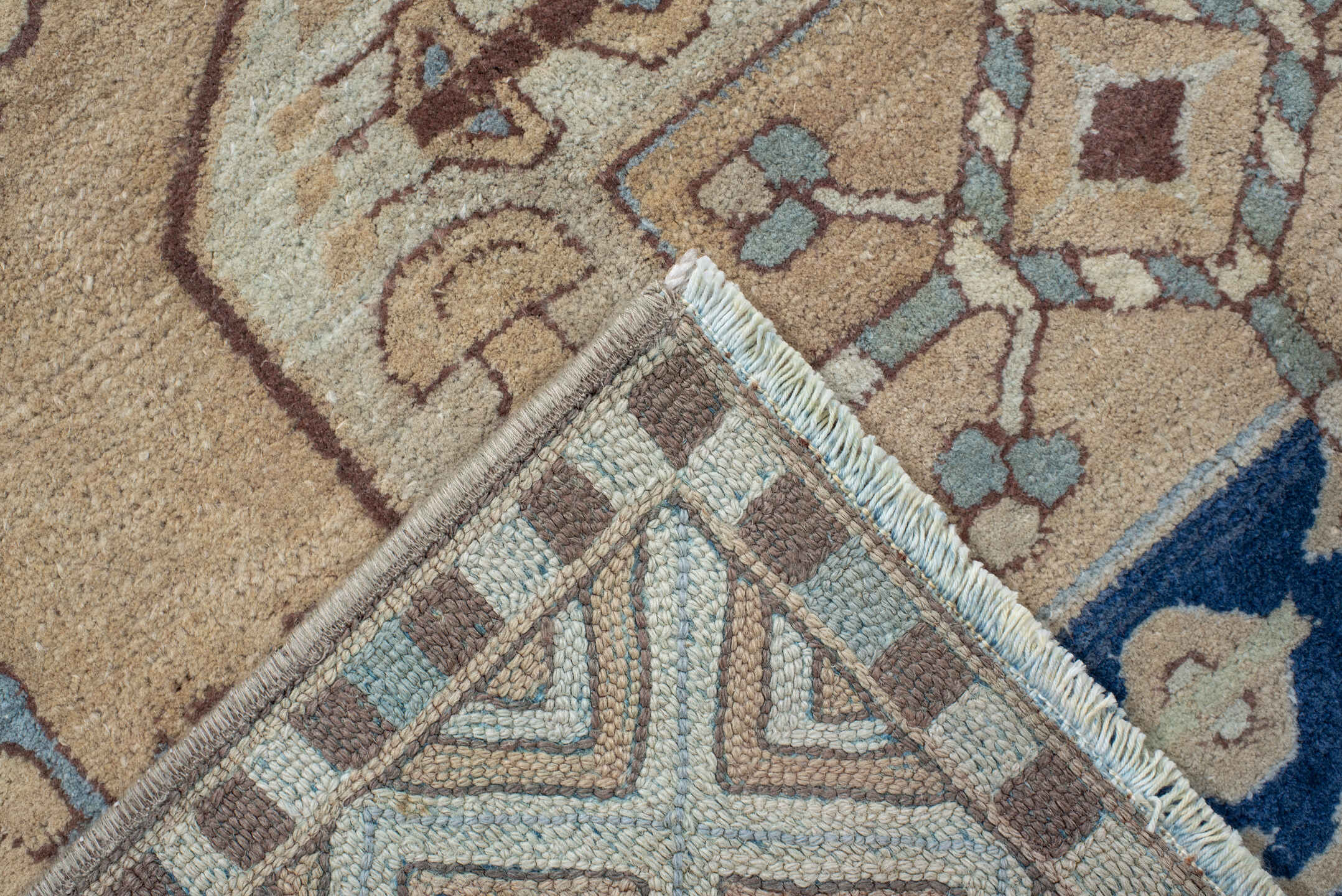 7' x 10' one-of-a-kind handmade vintage Hooked large size rug. Color palette: ivory, sky_blue, navy, tan, camel, taupe