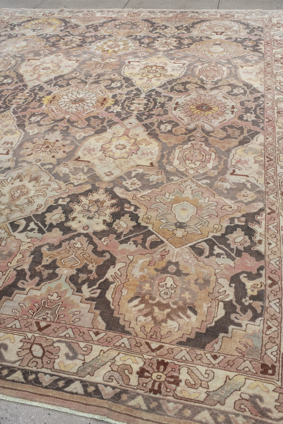 9' x 12' one-of-a-kind handmade antique Hooked large size rug. Color palette: ivory, blush, taupe, charcoal, peach, sage