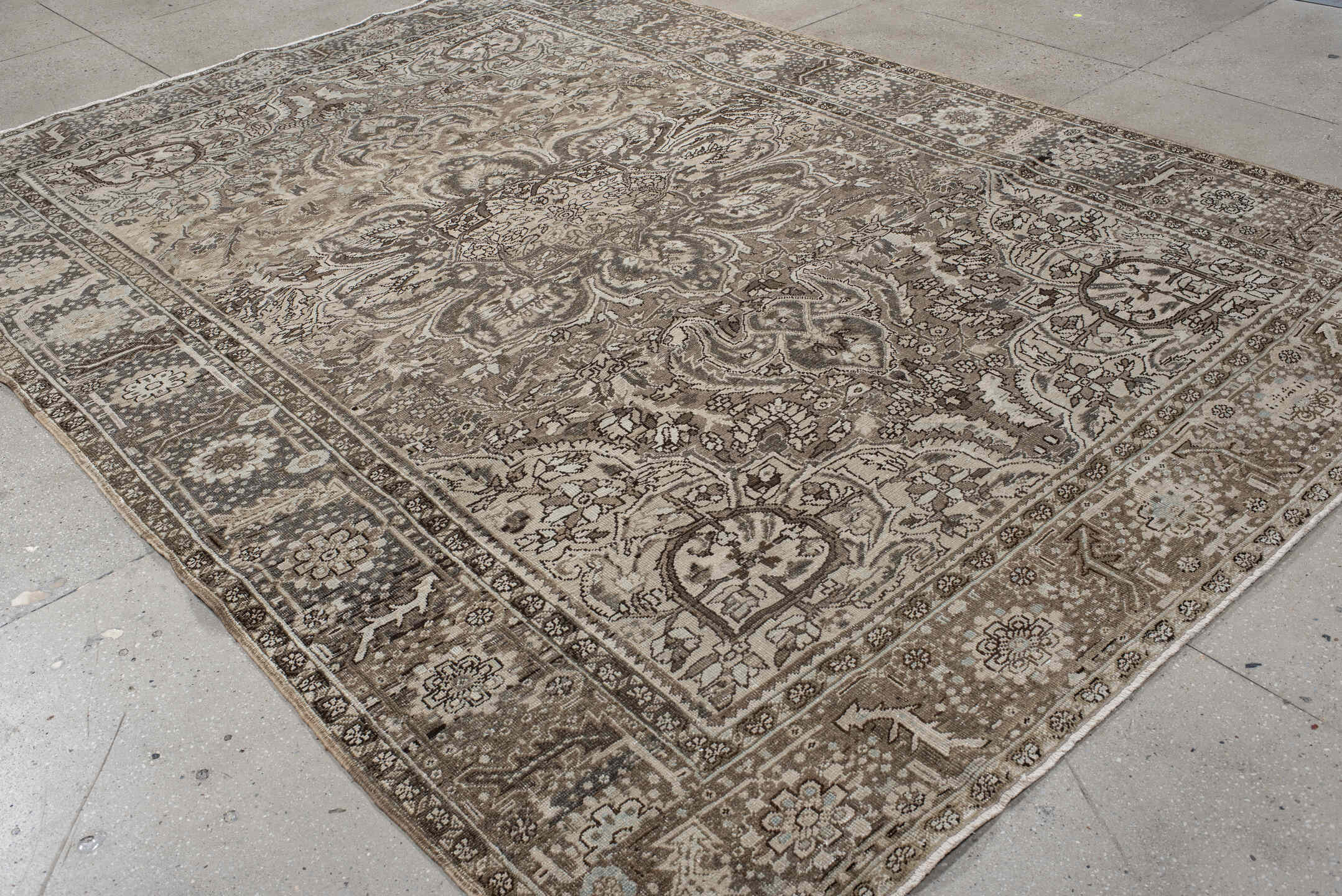 8' x 11' one-of-a-kind handmade antique Heriz large size rug. Color palette: taupe, brown, ivory, charcoal, slate, pale blue