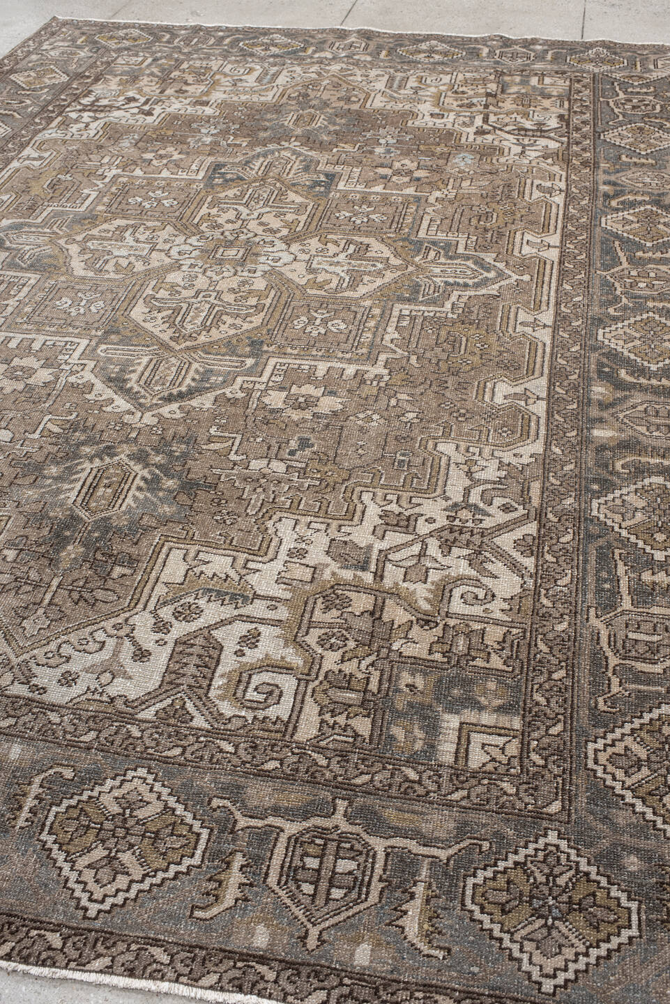8' x 11' one-of-a-kind handmade vintage Heriz large size rug. Color palette: taupe, ivory, slate, brown, gold, charcoal