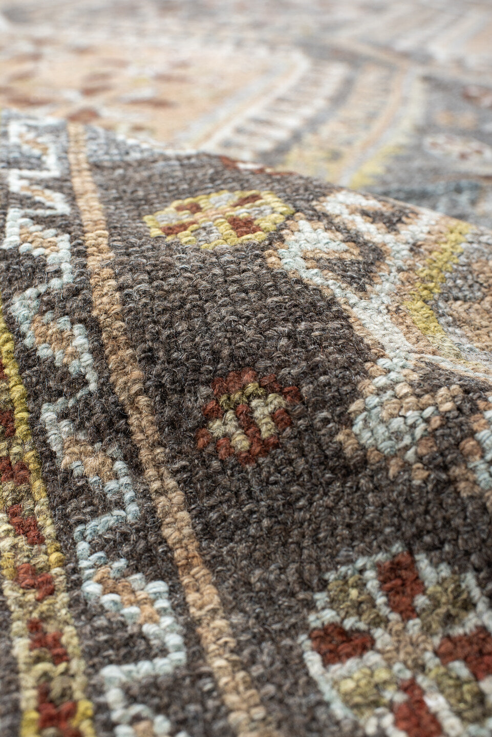 4' x 8' one-of-a-kind handmade vintage Shiraz rug. Color palette: slate, ivory, camel, taupe, rust, charcoal, sage, gold