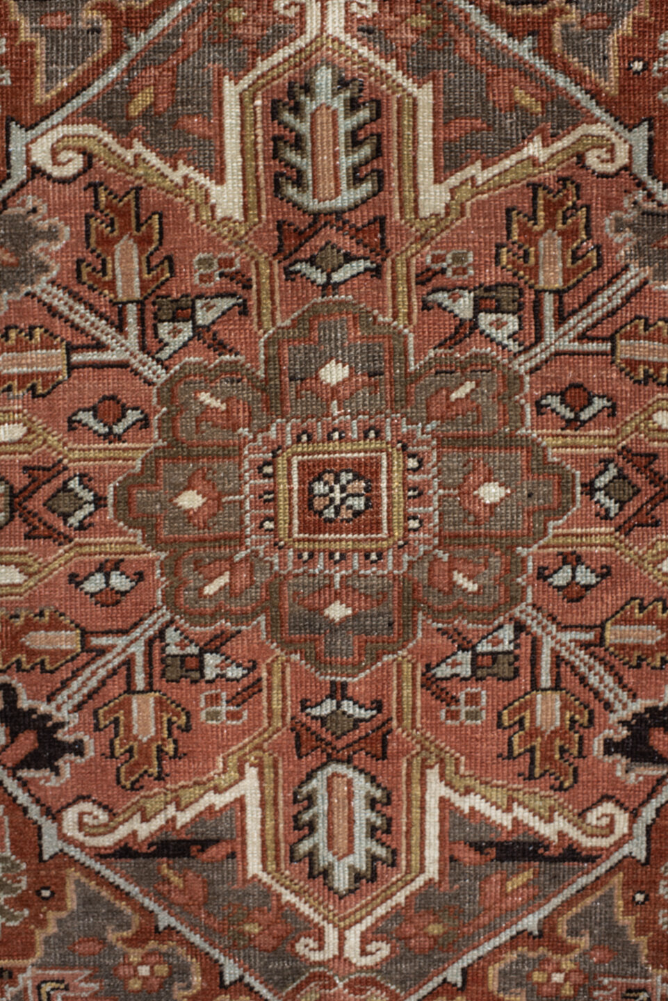 8' x 11' one-of-a-kind handmade antique Heriz large size rug. Color palette: terra cotta, ivory, charcoal, rust, sage, taupe