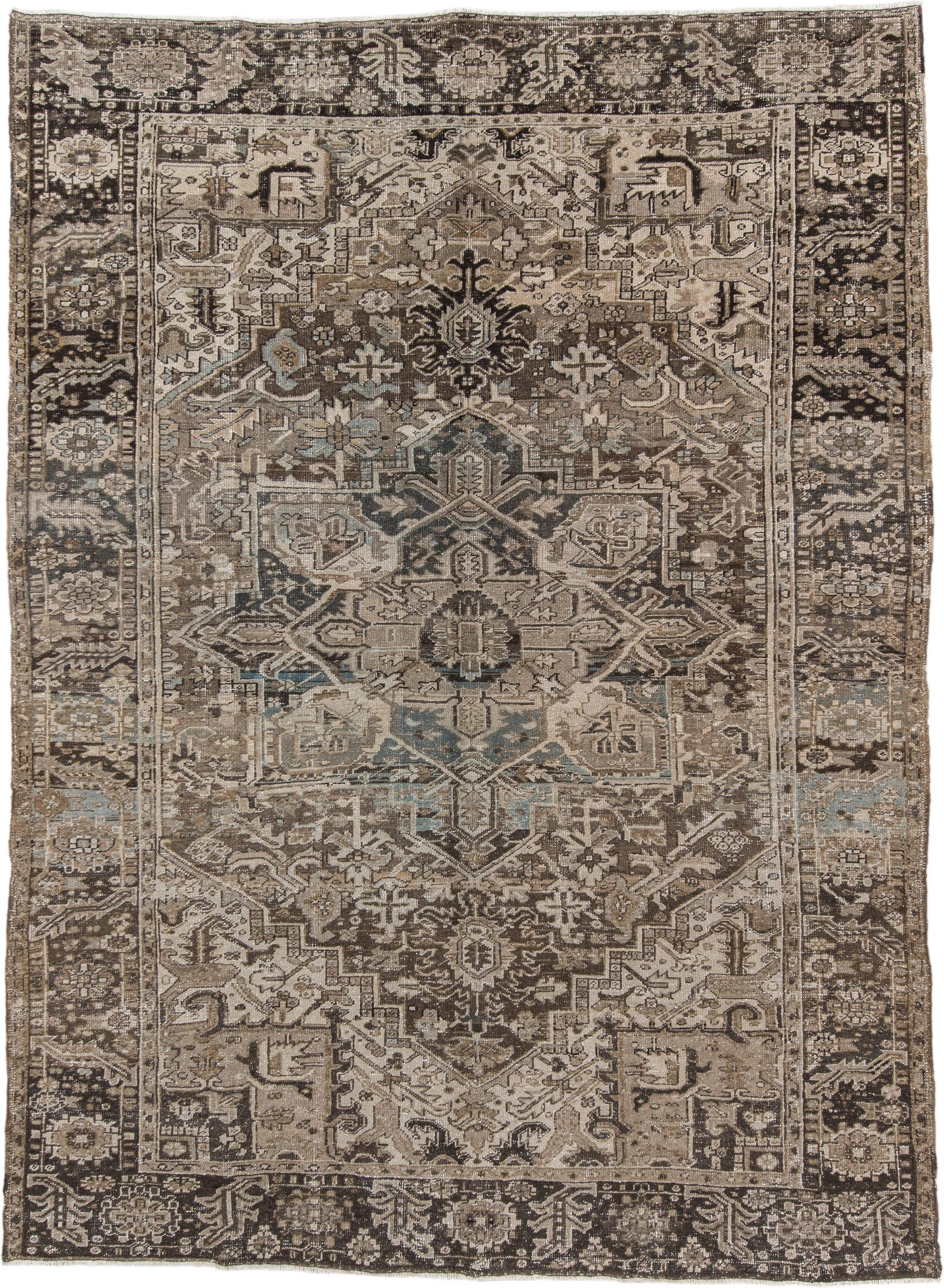 7' x 10' one-of-a-kind handmade antique Heriz large size rug. Color palette: taupe, brown, ivory, charcoal, faded blue
