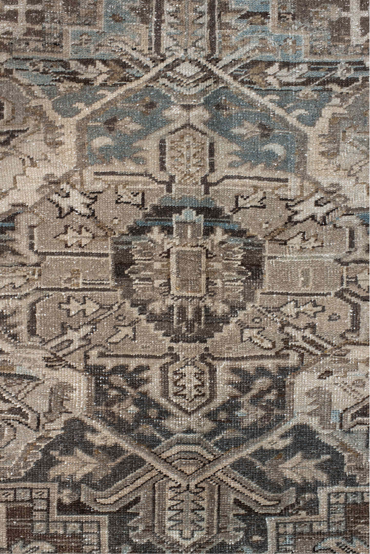 7' x 10' one-of-a-kind handmade antique Heriz large size rug. Color palette: taupe, brown, ivory, charcoal, faded blue