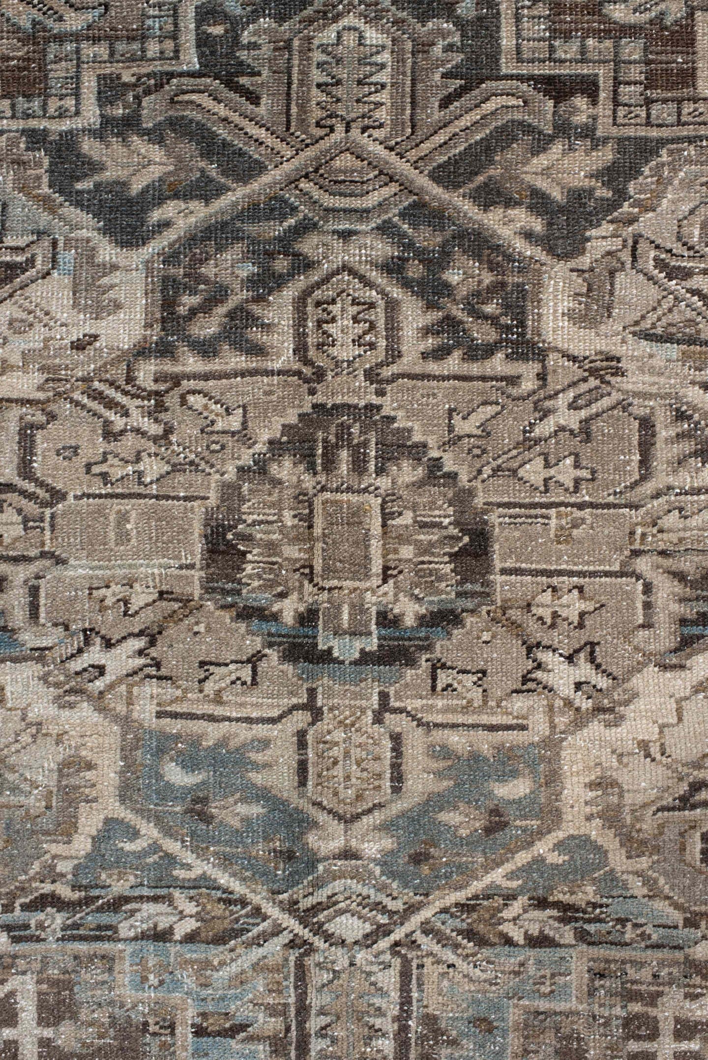 7' x 10' one-of-a-kind handmade antique Heriz large size rug. Color palette: taupe, brown, ivory, charcoal, faded blue