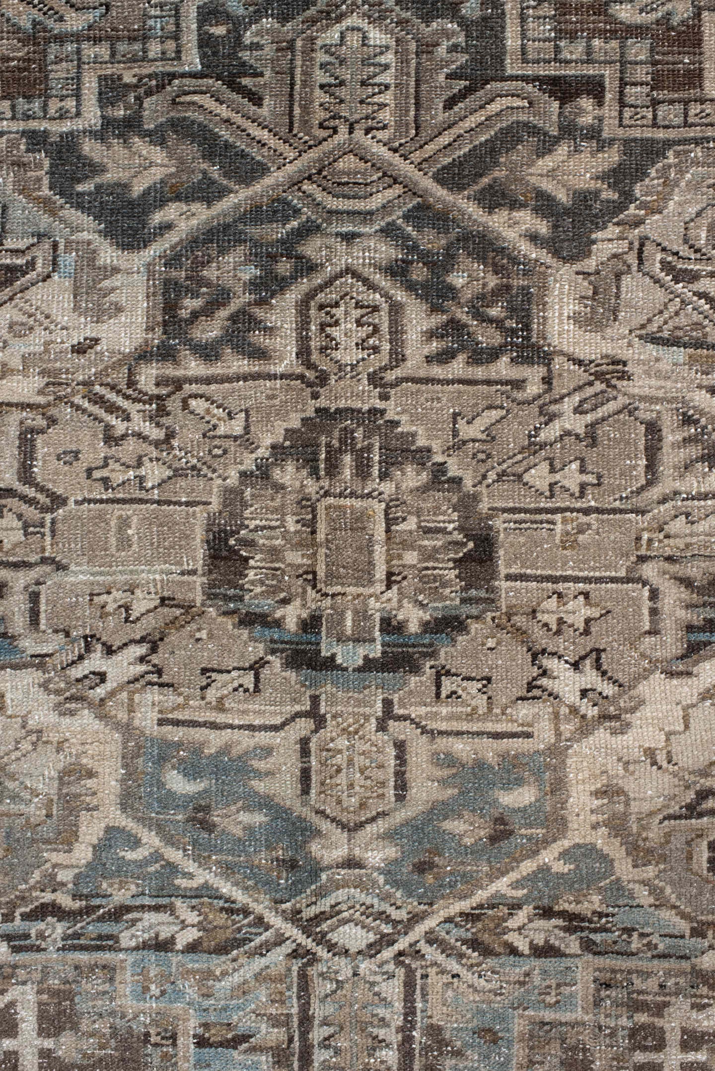 7' x 10' one-of-a-kind handmade antique Heriz large size rug. Color palette: taupe, brown, ivory, charcoal, faded blue