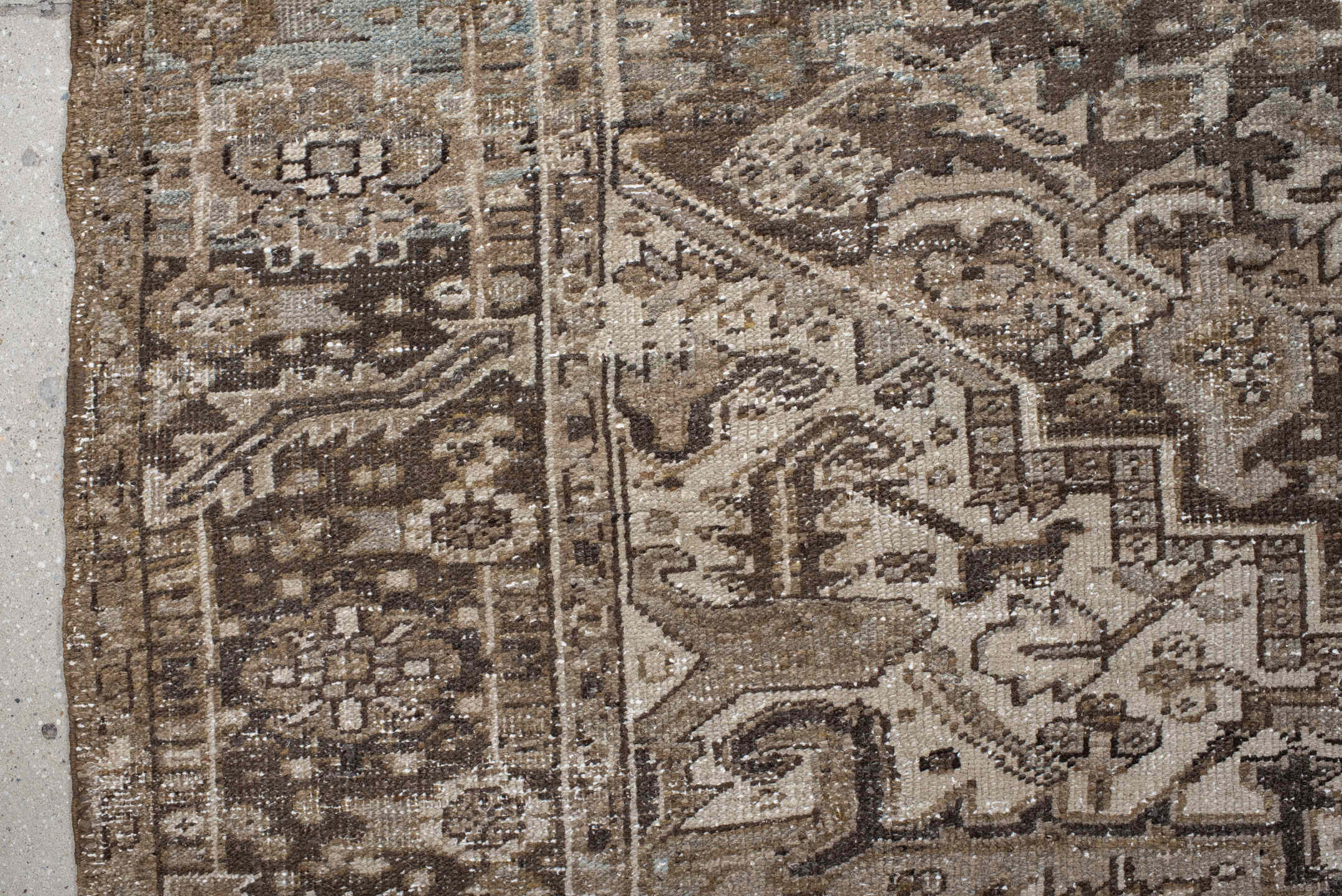 7' x 10' one-of-a-kind handmade antique Heriz large size rug. Color palette: taupe, brown, ivory, charcoal, faded blue