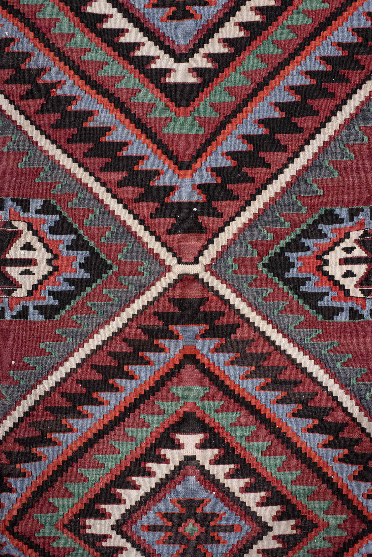 6' x 11' one-of-a-kind handmade vintage Kilim large size rug. Color palette: rust, burgundy, slate, ivory, black, teal