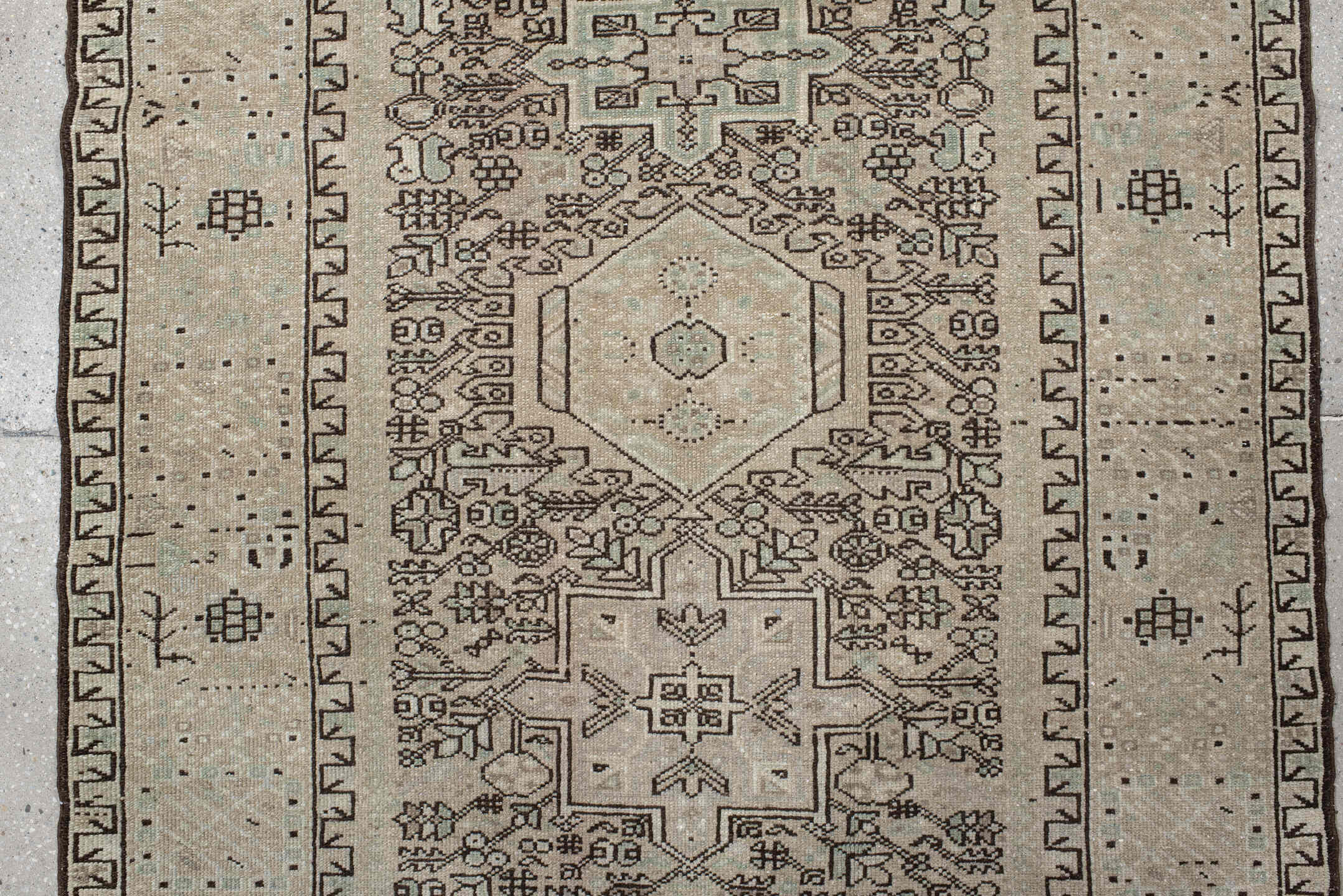 4' x 10' one-of-a-kind handmade vintage Karaje runner rug. Color palette: ivory, taupe, brown, camel, sage, charcoal, beige
