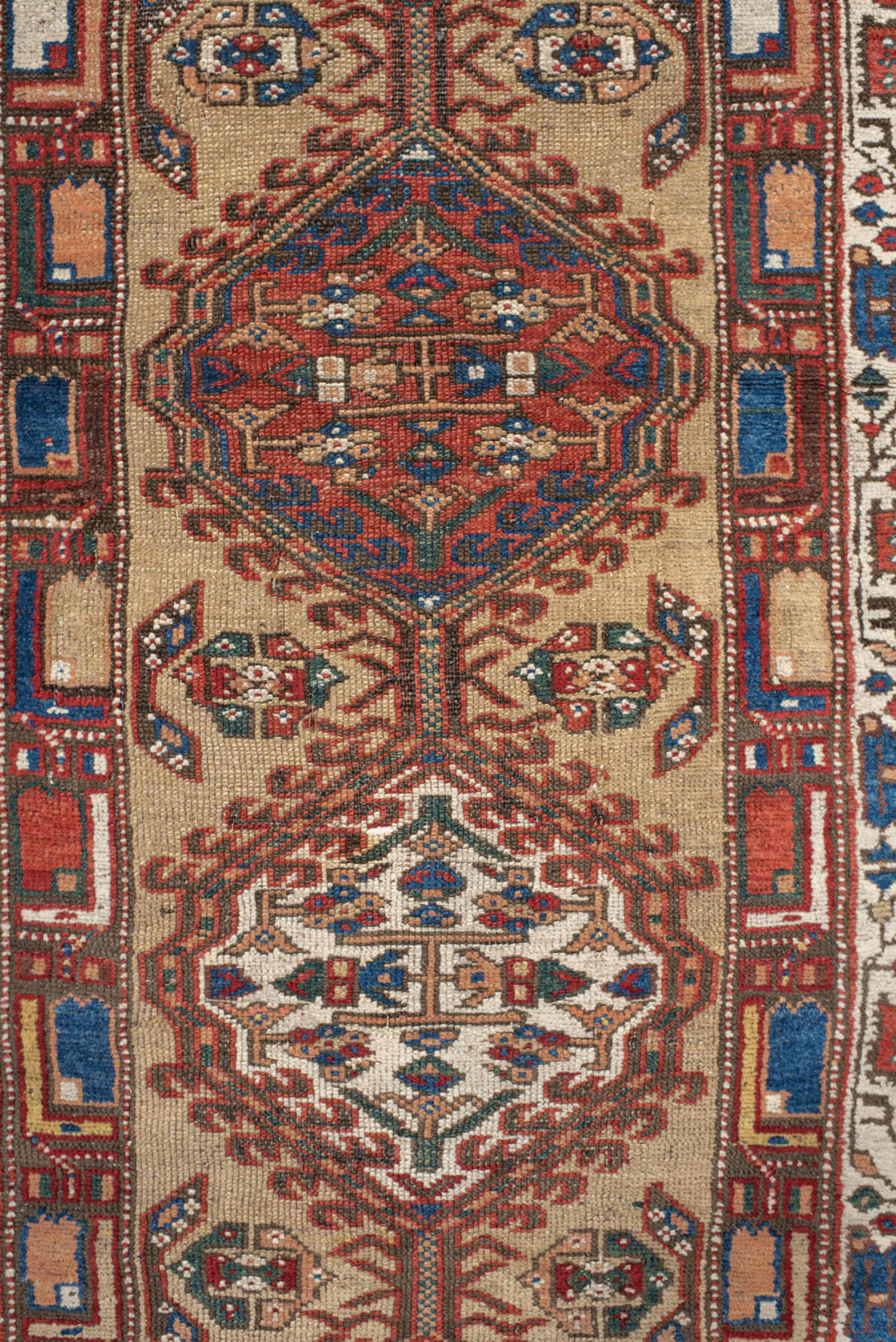 3' x 13' one-of-a-kind handmade vintage Sarab runner rug. Color palette: ivory, rust, indigo, teal, camel, crimson, brown