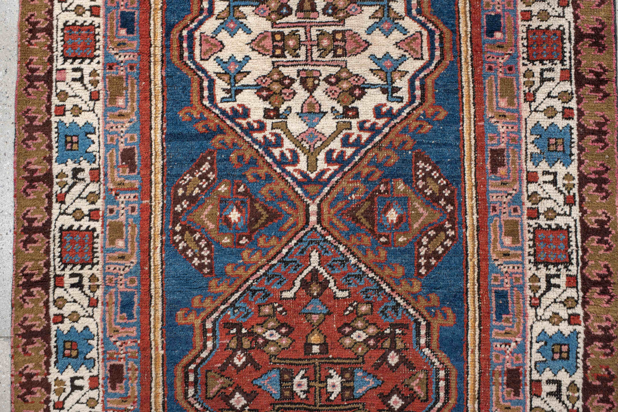 3' x 7' one-of-a-kind handmade vintage Sarab runner rug. Color palette: red, blue, ivory, rose, brown, burgundy, camel, pink