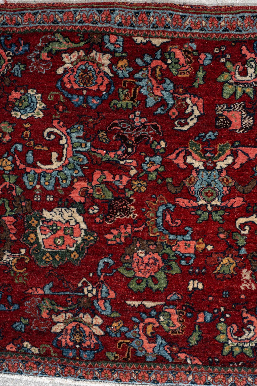 1' x 2' one-of-a-kind handmade vintage Bidjar small size rug. Color palette: rust, turquoise, navy, ivory, rose, sage, coral
