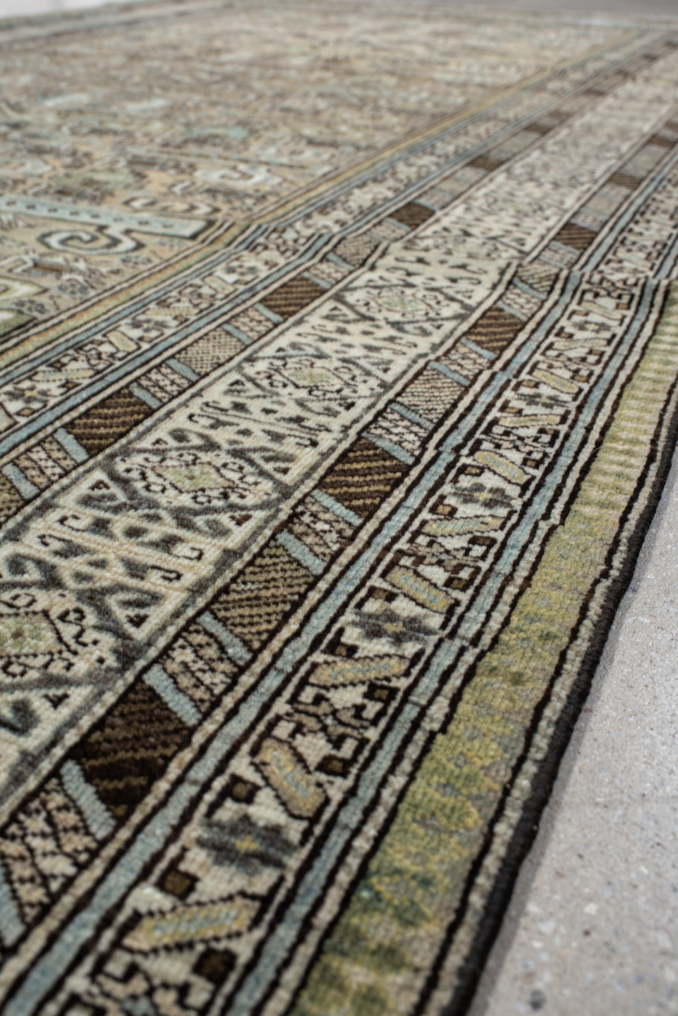 5' x 9' one-of-a-kind handmade vintage Ardebil medium size rug. Color palette: light gray, off-white, gray, black, dark gray