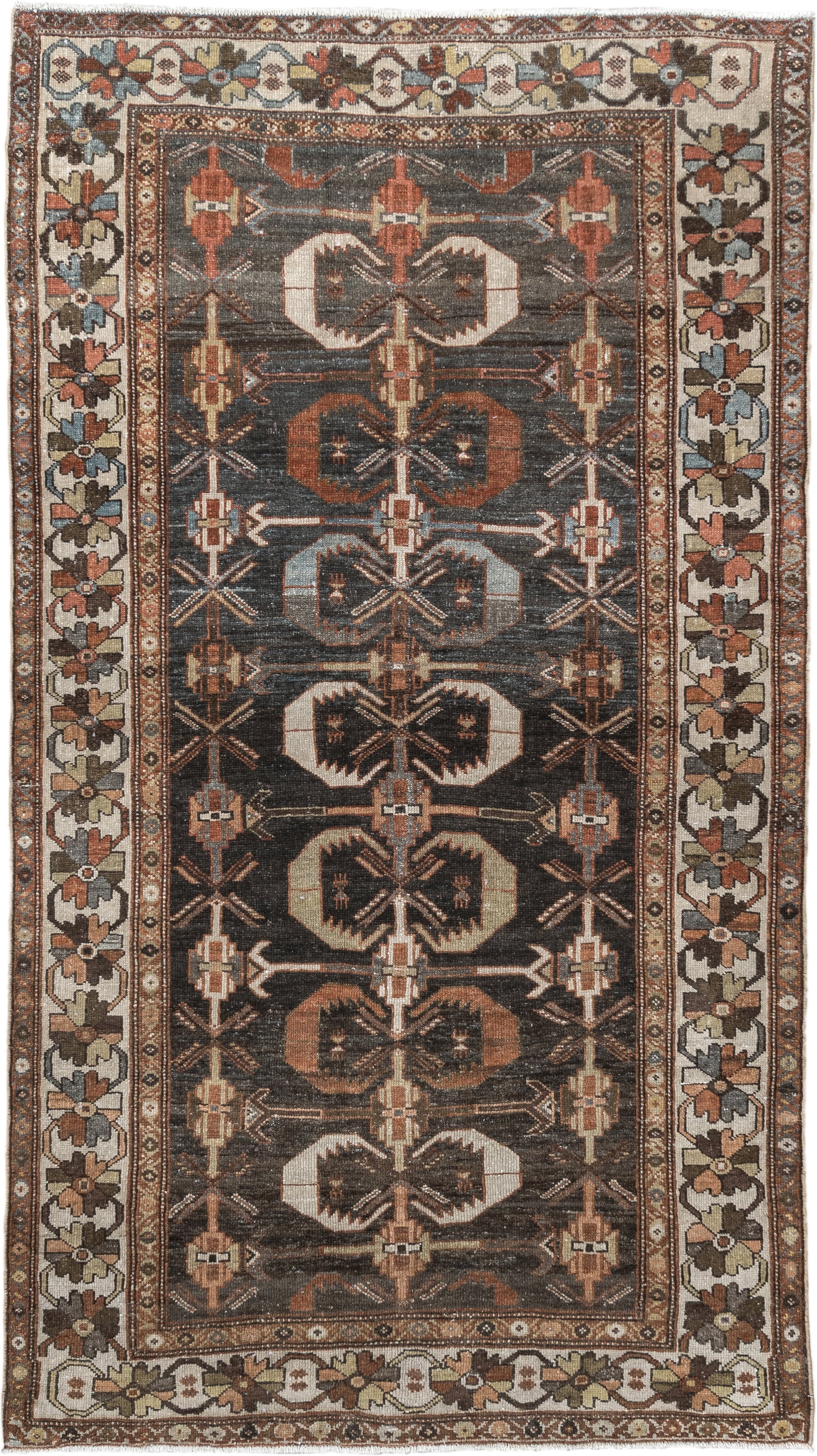 4' x 7' one-of-a-kind handmade antique Shirvan rug. Color palette: charcoal, ivory, rust, taupe, slate, camel, terracotta