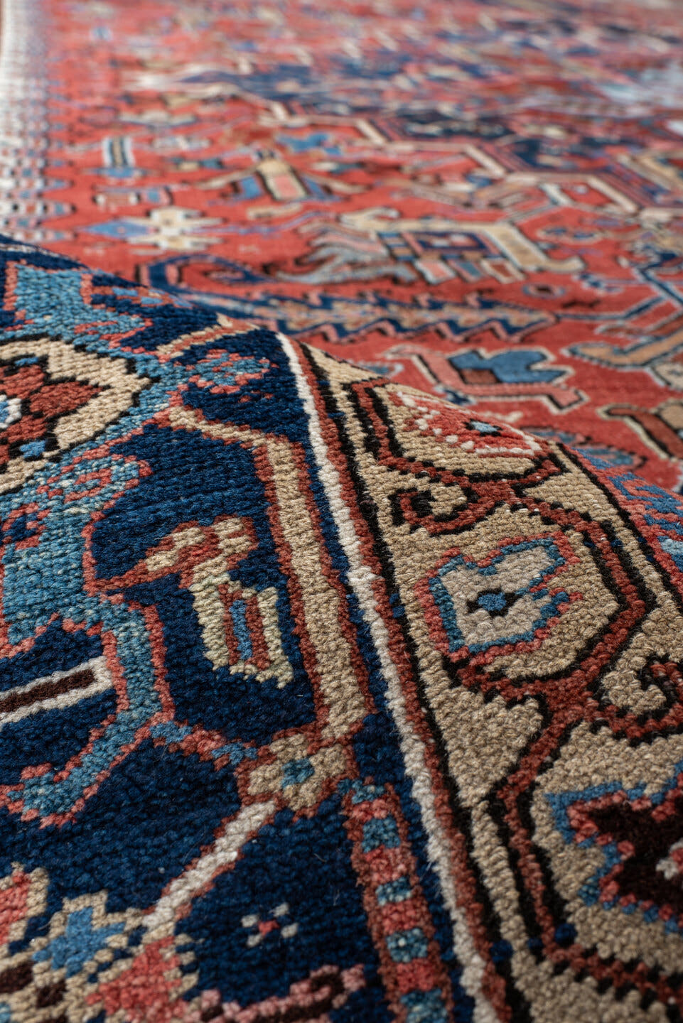 9' x 12' one-of-a-kind handmade vintage Heriz large size rug. Color palette: rust, navy, ivory, sky_blue, camel, terracotta