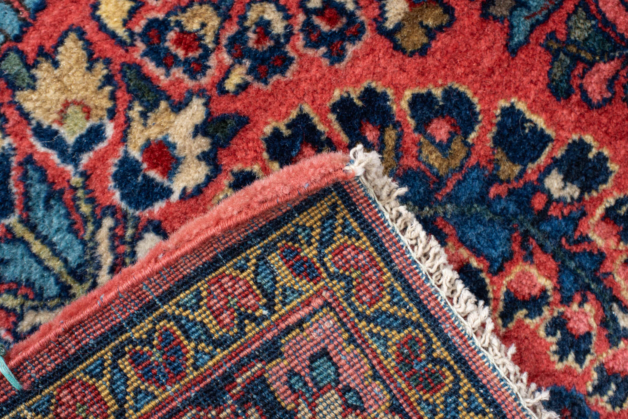 2' x 12' one-of-a-kind handmade antique Sarouk runner rug. Color palette: rust, navy, ivory, rose, teal, gold, burgundy