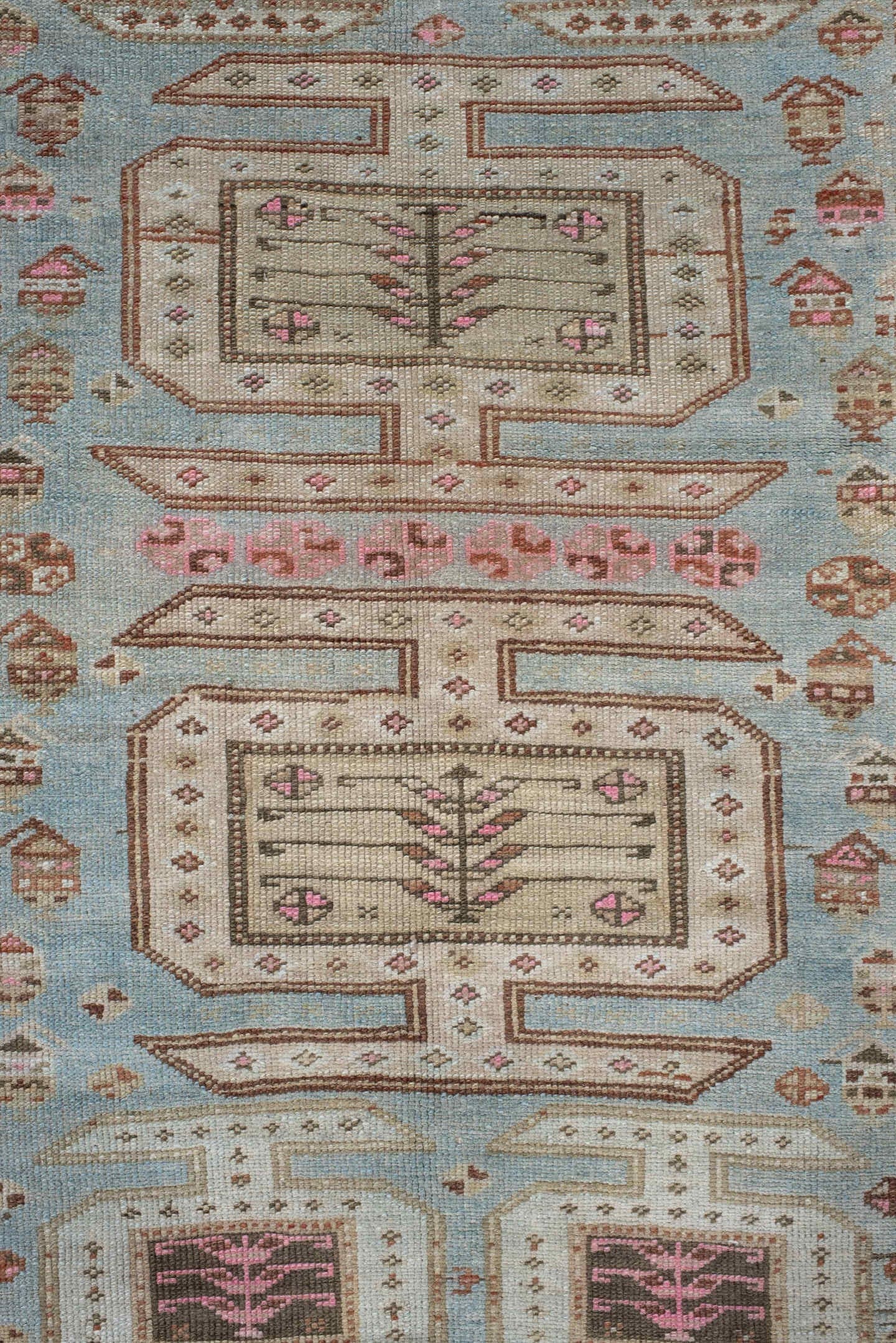 3' x 11' one-of-a-kind handmade vintage runner rug. Color palette: ivory, sky blue, brown, rust, taupe, rose, charcoal
