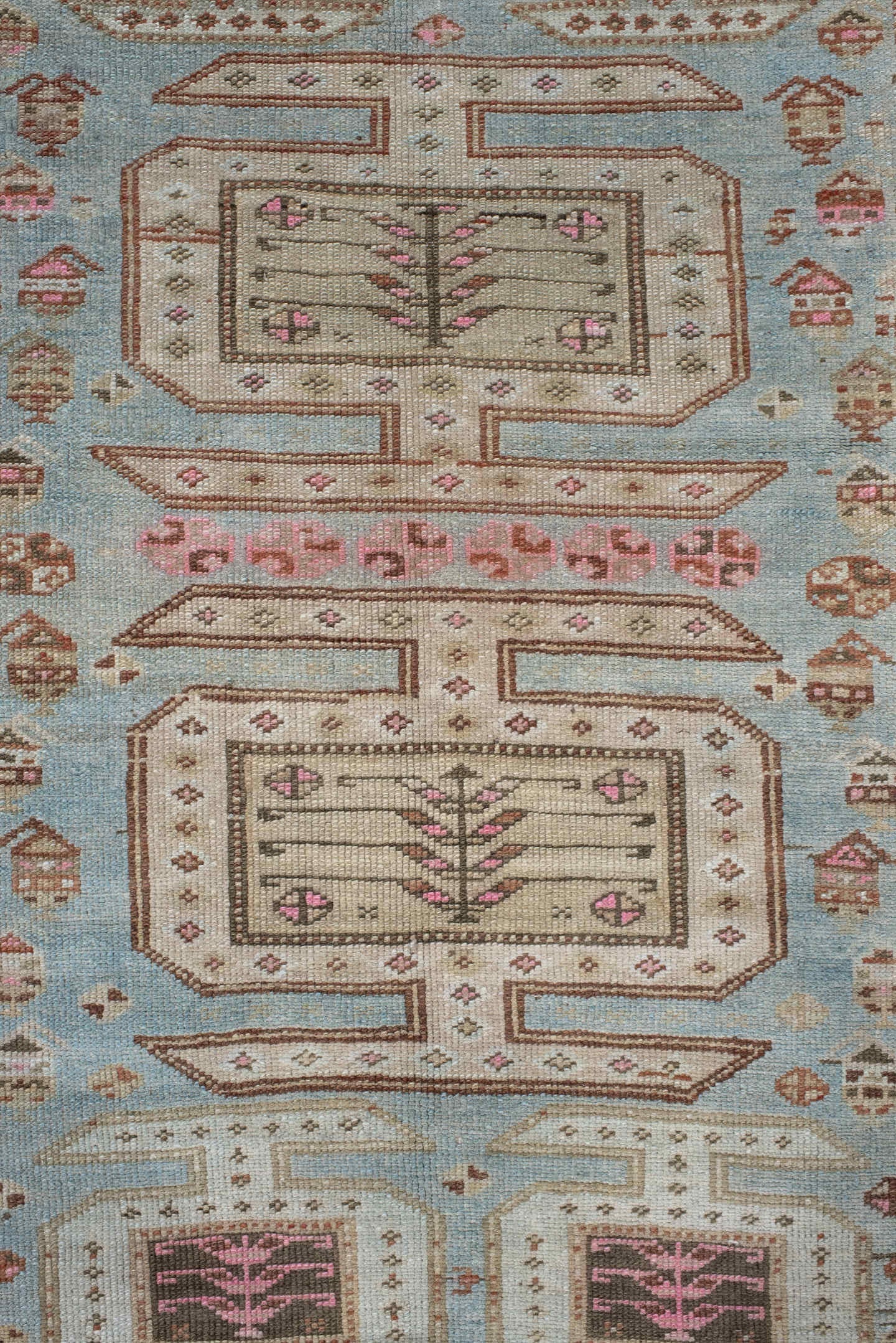3' x 11' one-of-a-kind handmade vintage runner rug. Color palette: ivory, sky blue, brown, rust, taupe, rose, charcoal