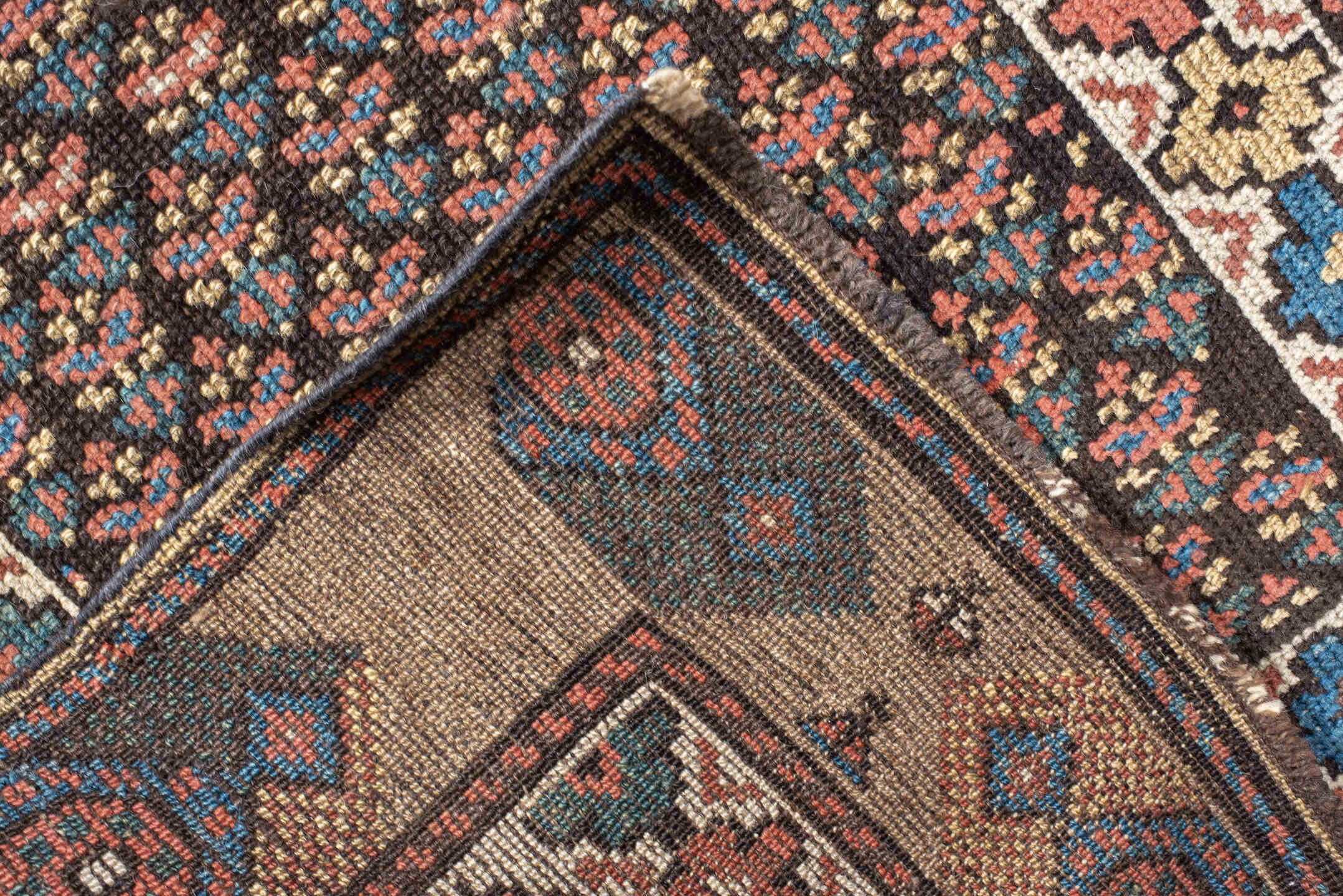 2' x 11' one-of-a-kind handmade vintage NW Persian runner rug. Color palette: navy, ivory, rust, blue, camel, rose, charcoal