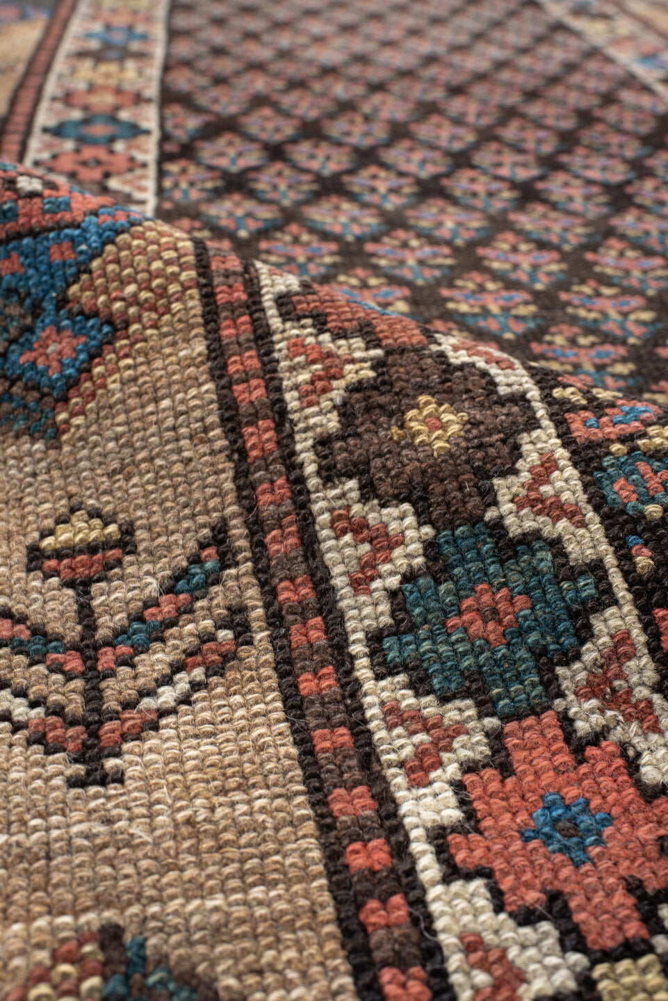 2' x 11' one-of-a-kind handmade vintage NW Persian runner rug. Color palette: navy, ivory, rust, blue, camel, rose, charcoal