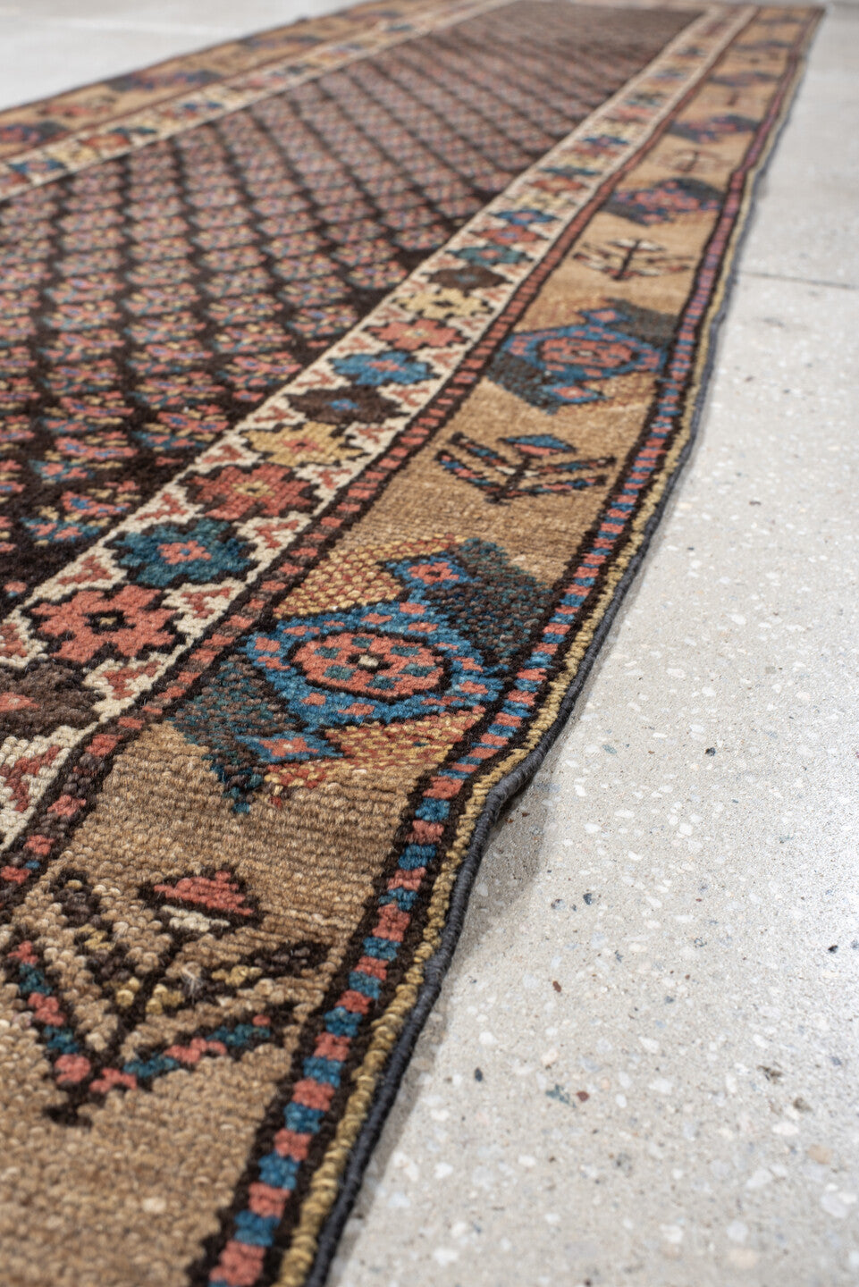 2' x 11' one-of-a-kind handmade vintage NW Persian runner rug. Color palette: navy, ivory, rust, blue, camel, rose, charcoal