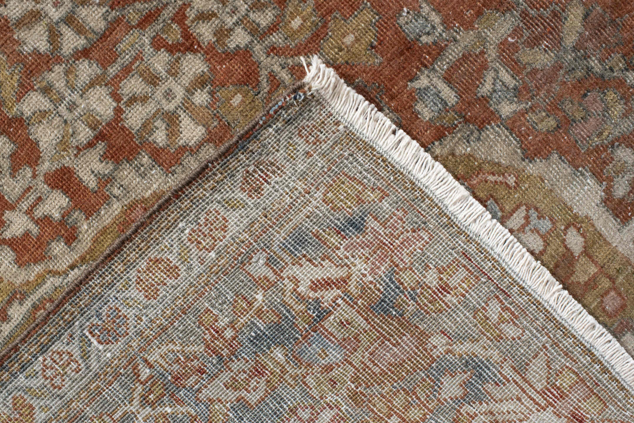7' x 9' one-of-a-kind handmade antique Far.Sarouk rug. Color palette: rust, terracotta, ivory, slate, taupe, camel, charcoal