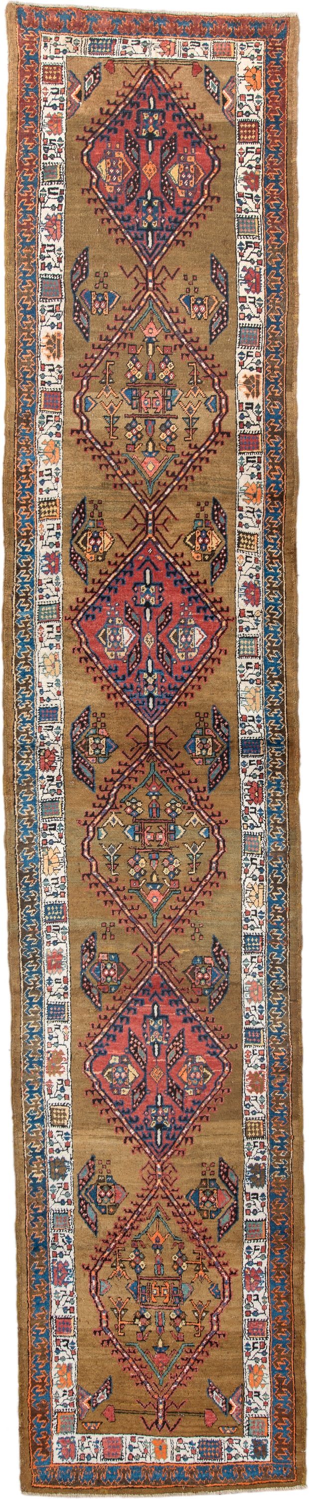 3' x 16' one-of-a-kind handmade vintage Sarab runner rug. Color palette: camel, rust, ivory, navy, terra cotta, indigo, rose