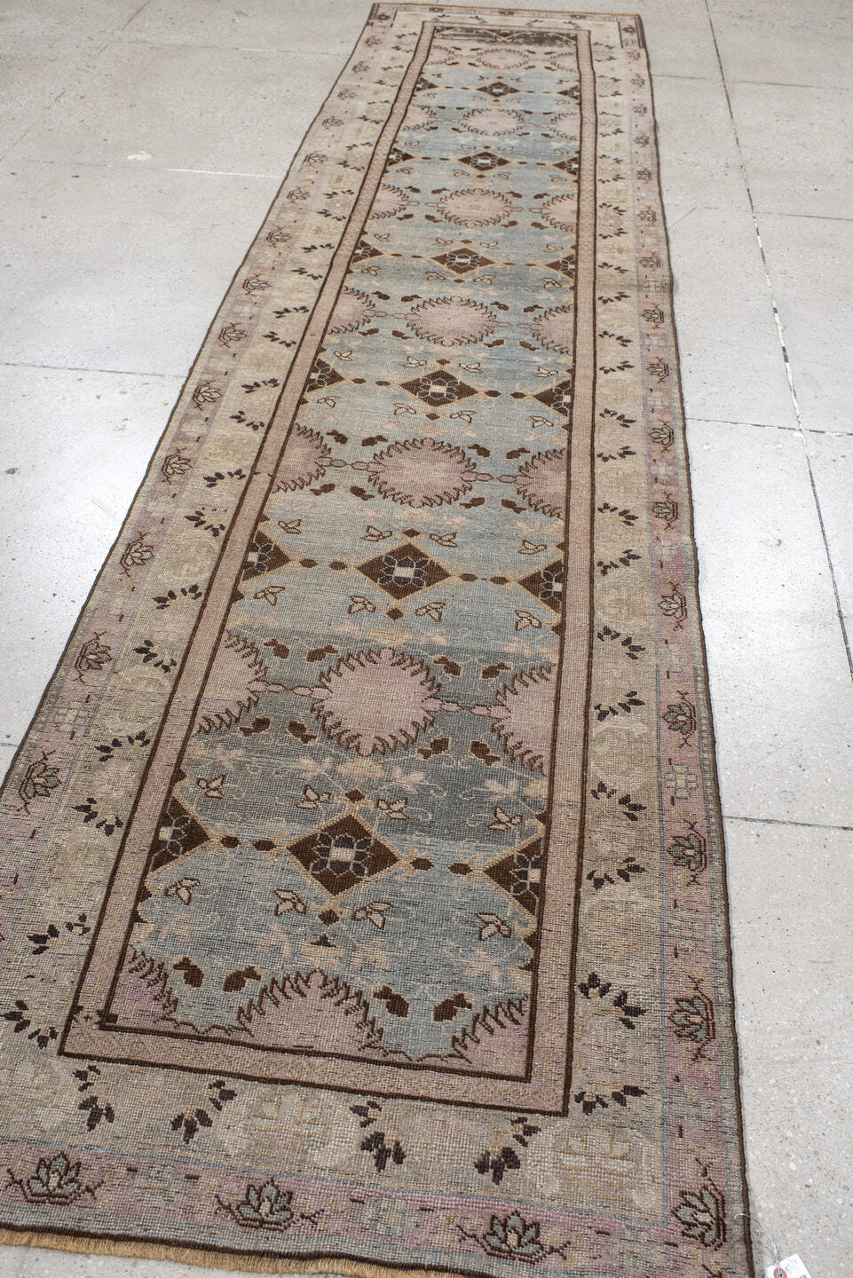 3' x 13' one-of-a-kind handmade vintage Bidjar runner rug. Color palette: ivory, light blue, taupe, brown, rose, charcoal