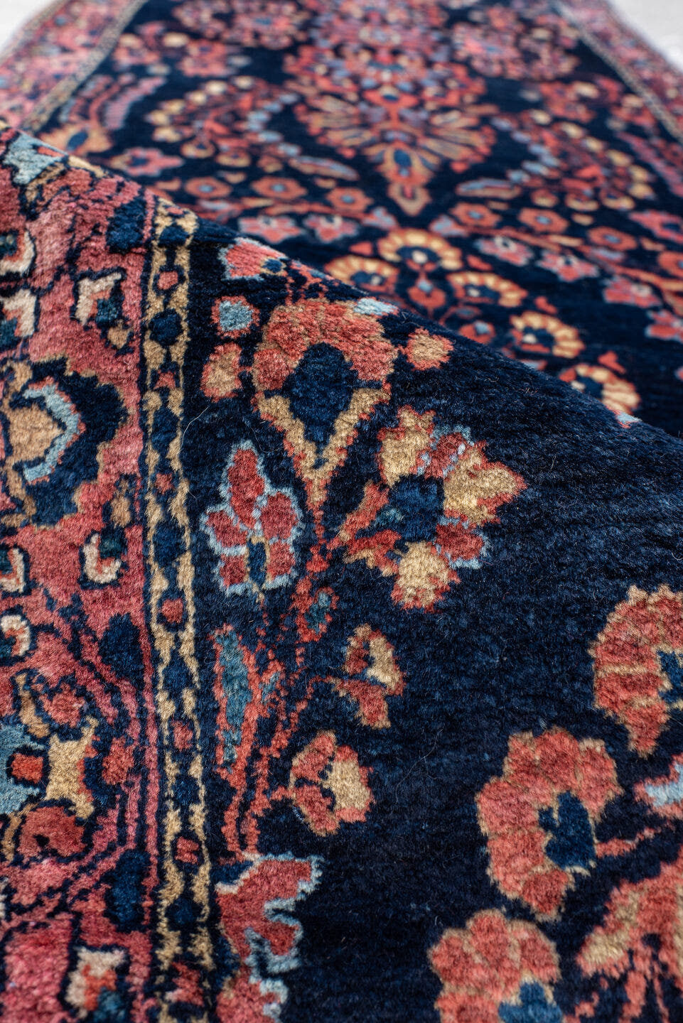 2' x 15' one-of-a-kind handmade vintage Sarouk runner rug. Color palette: navy, rose, crimson, ivory, sky blue, burgundy