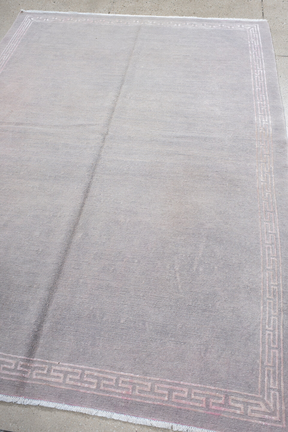 5' x 7' one-of-a-kind handmade vintage Nepal rug. Color palette: taupe, ivory, beige, cream, pale gray, gray, light gray