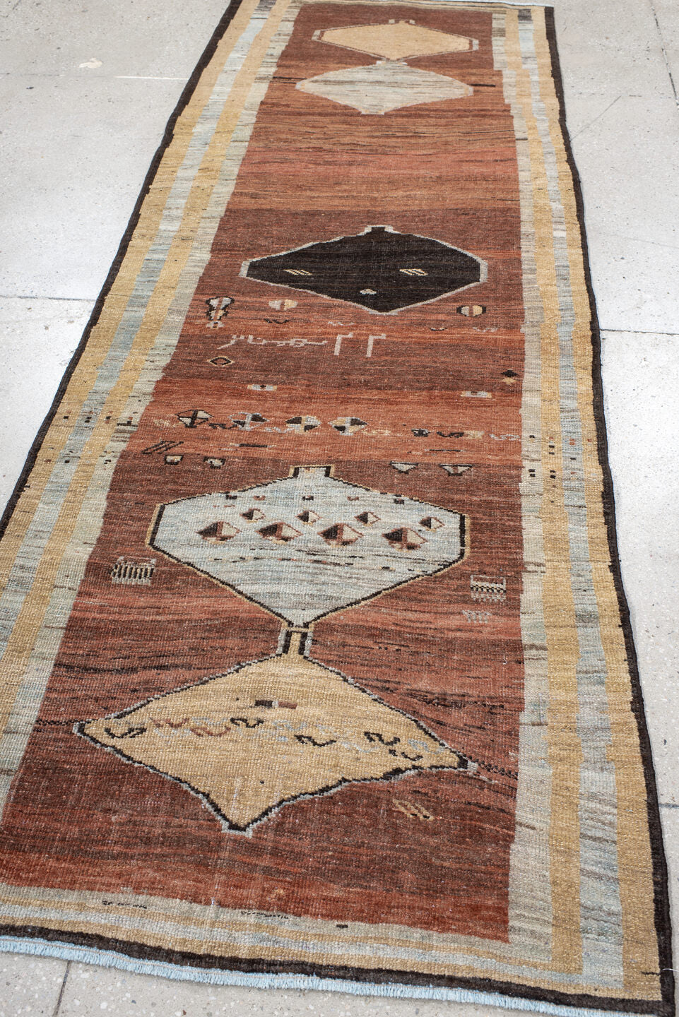 3' x 9' one-of-a-kind handmade vintage Gabbe runner rug. Color palette: rust, ivory, light blue, charcoal, taupe, brown