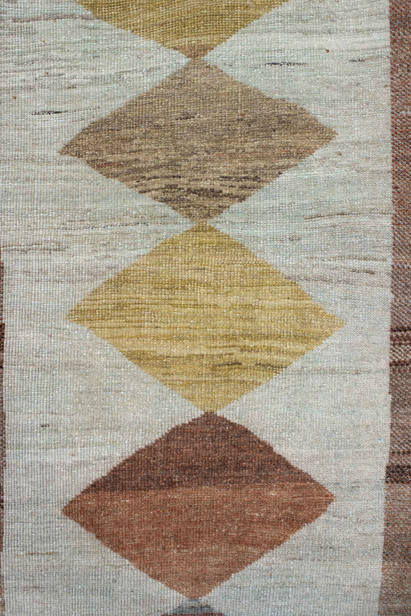 3' x 12' one-of-a-kind handmade vintage Gabbe runner rug. Color palette: ivory, taupe, rust, camel, slate, brown, sage